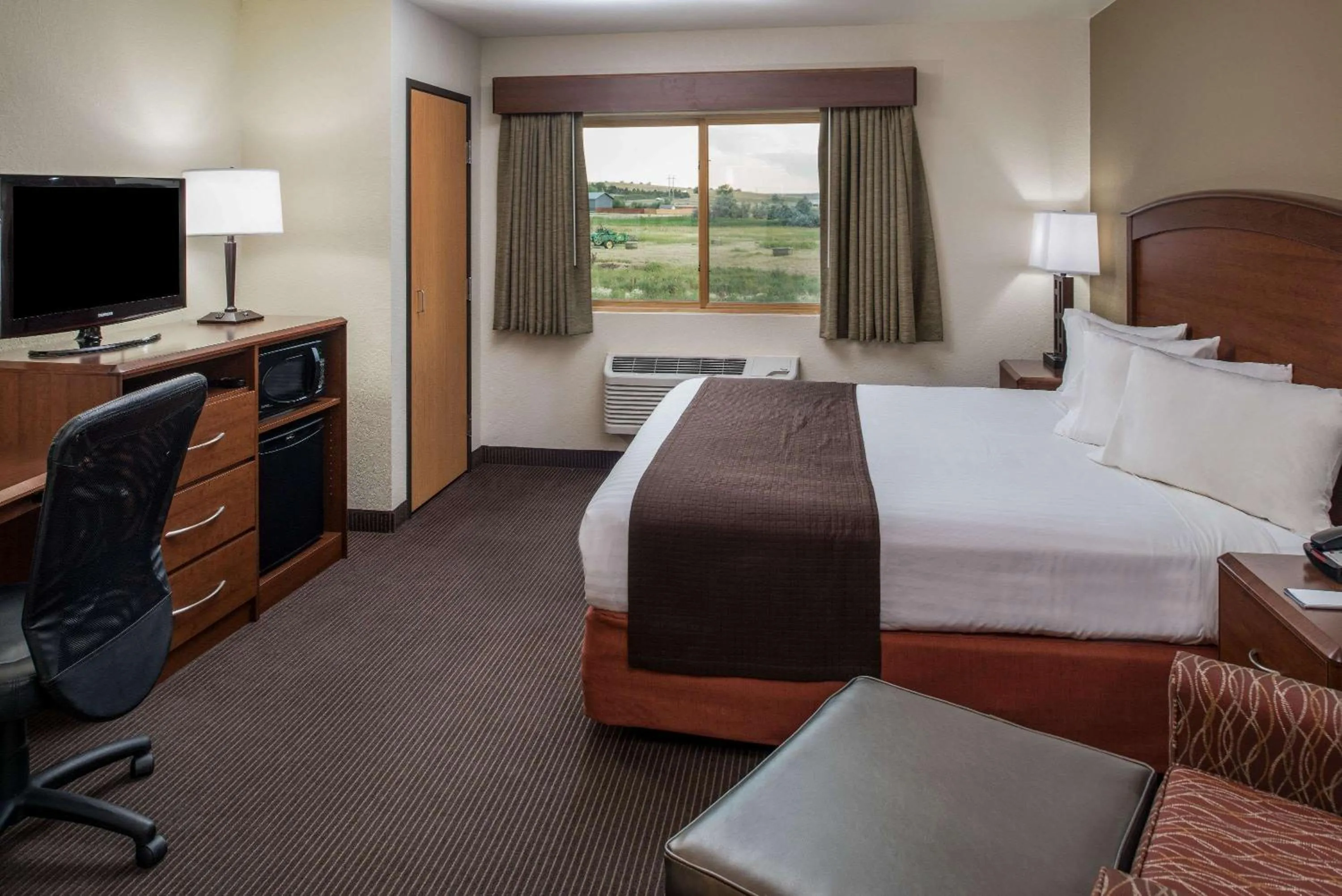 Photo of the whole room, Bed in AmericInn by Wyndham Belle Fourche
