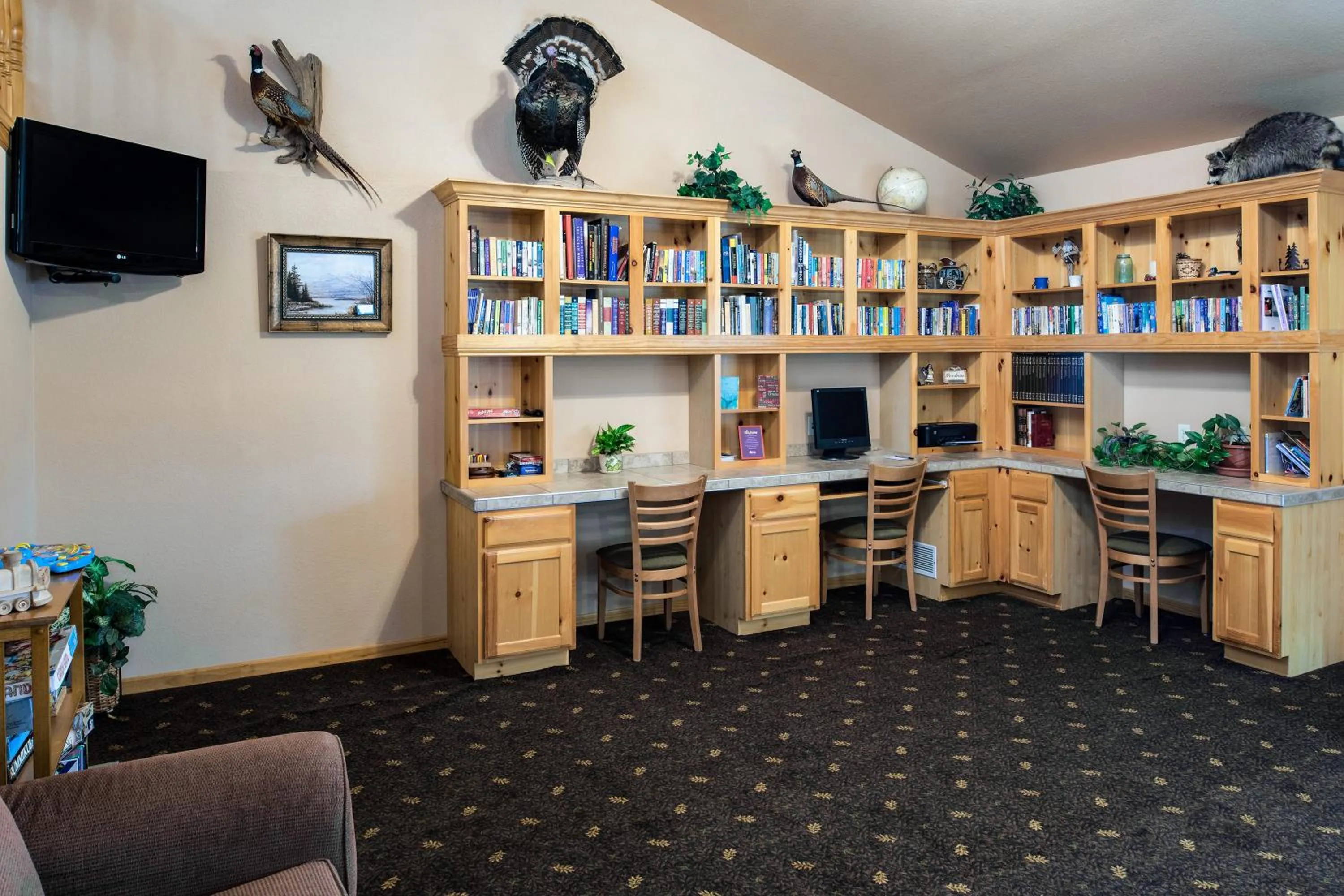 Lobby or reception in AmericInn by Wyndham Belle Fourche