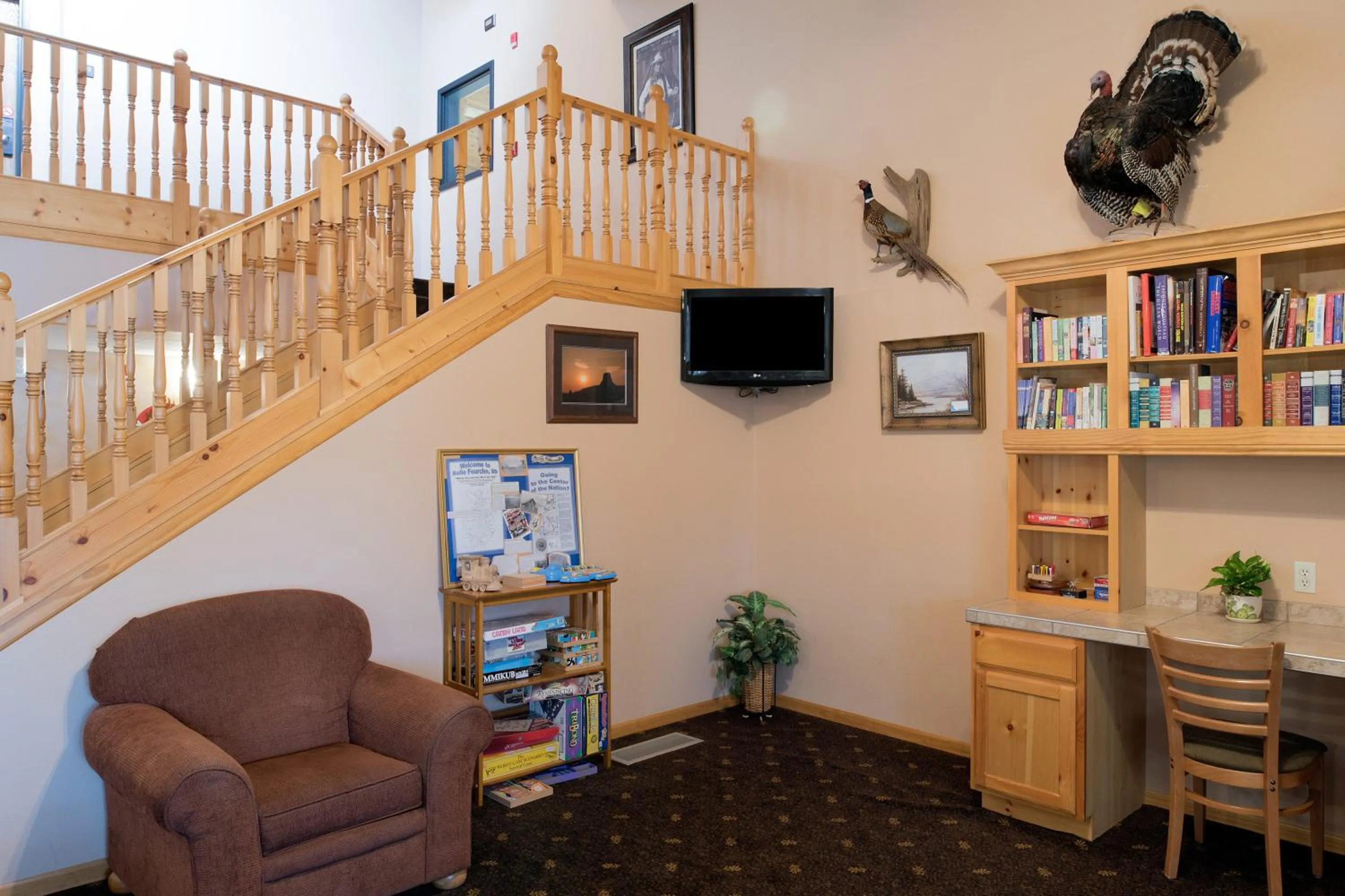 Lobby or reception in AmericInn by Wyndham Belle Fourche