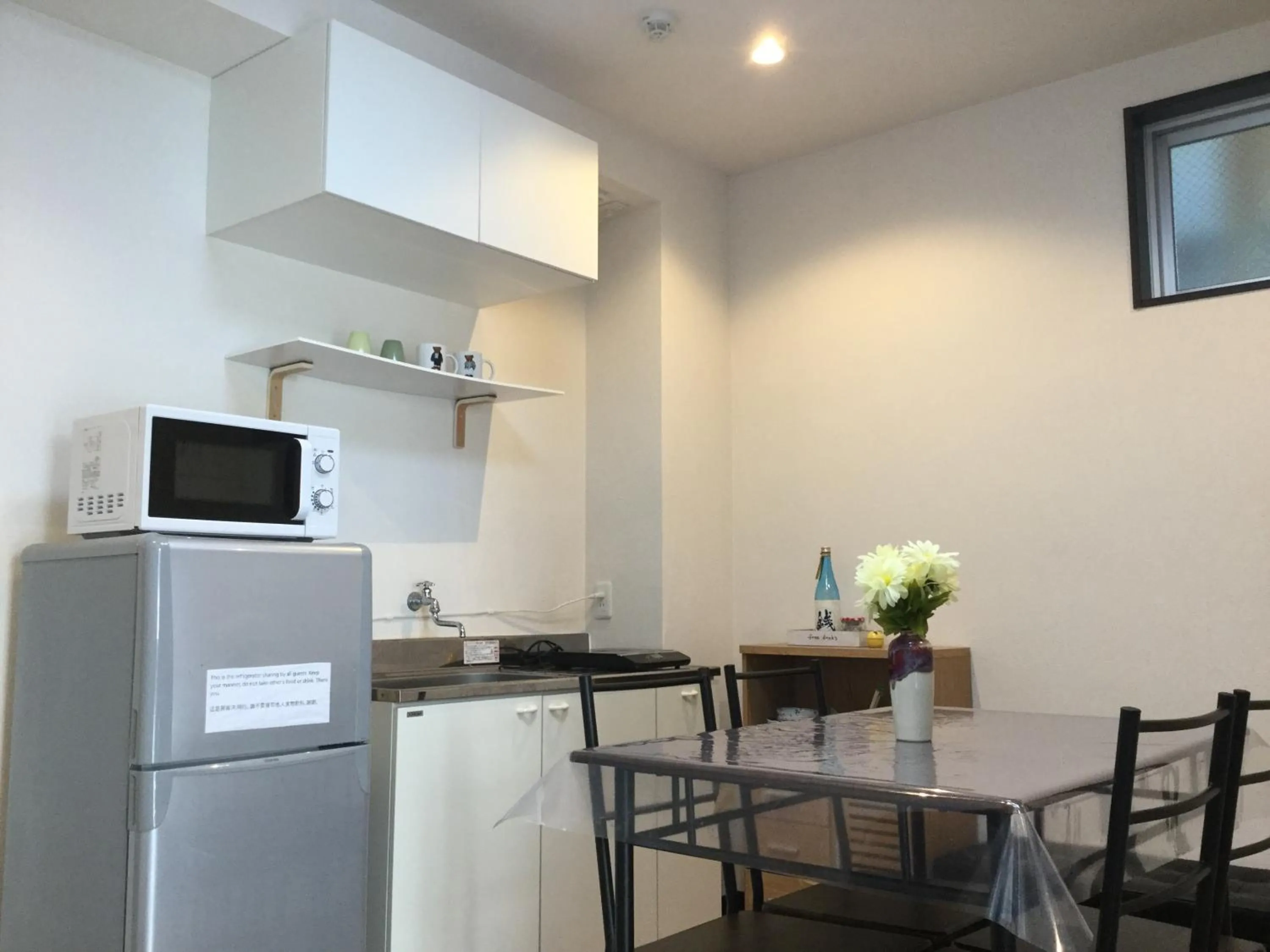Kitchen or kitchenette in Keimei Guest House