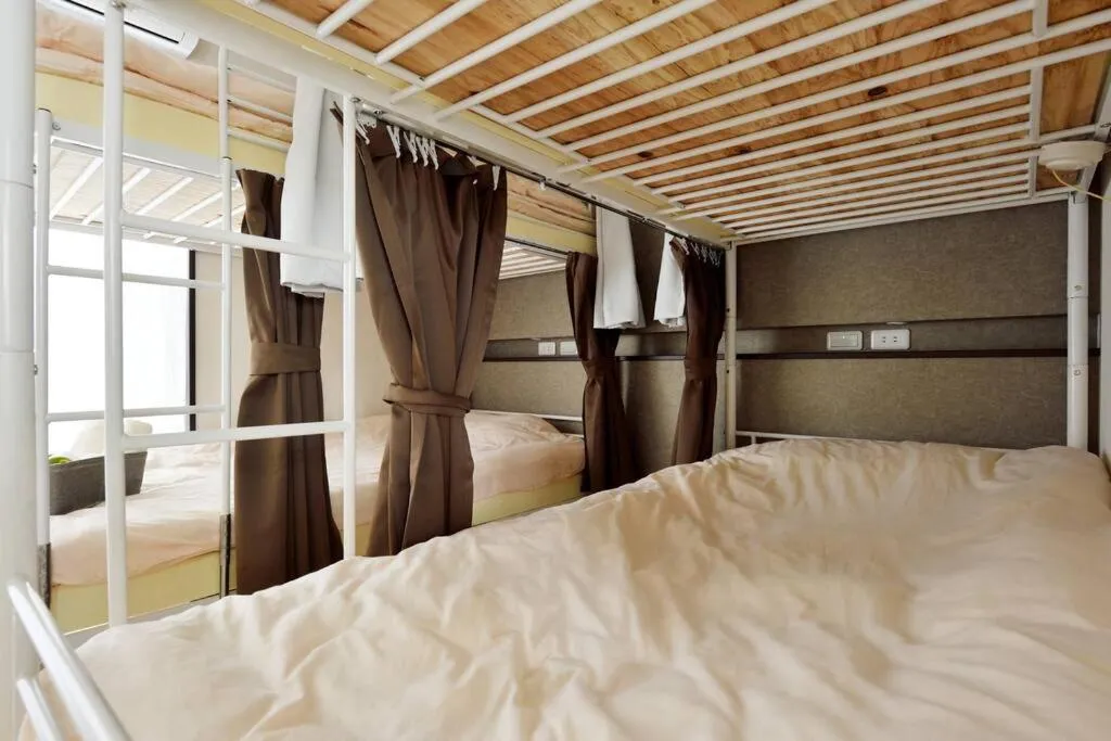 Bed in Keimei Guest House