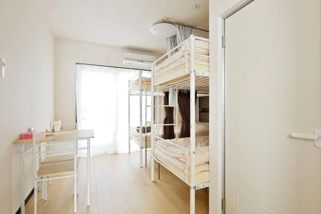 Bed in Keimei Guest House