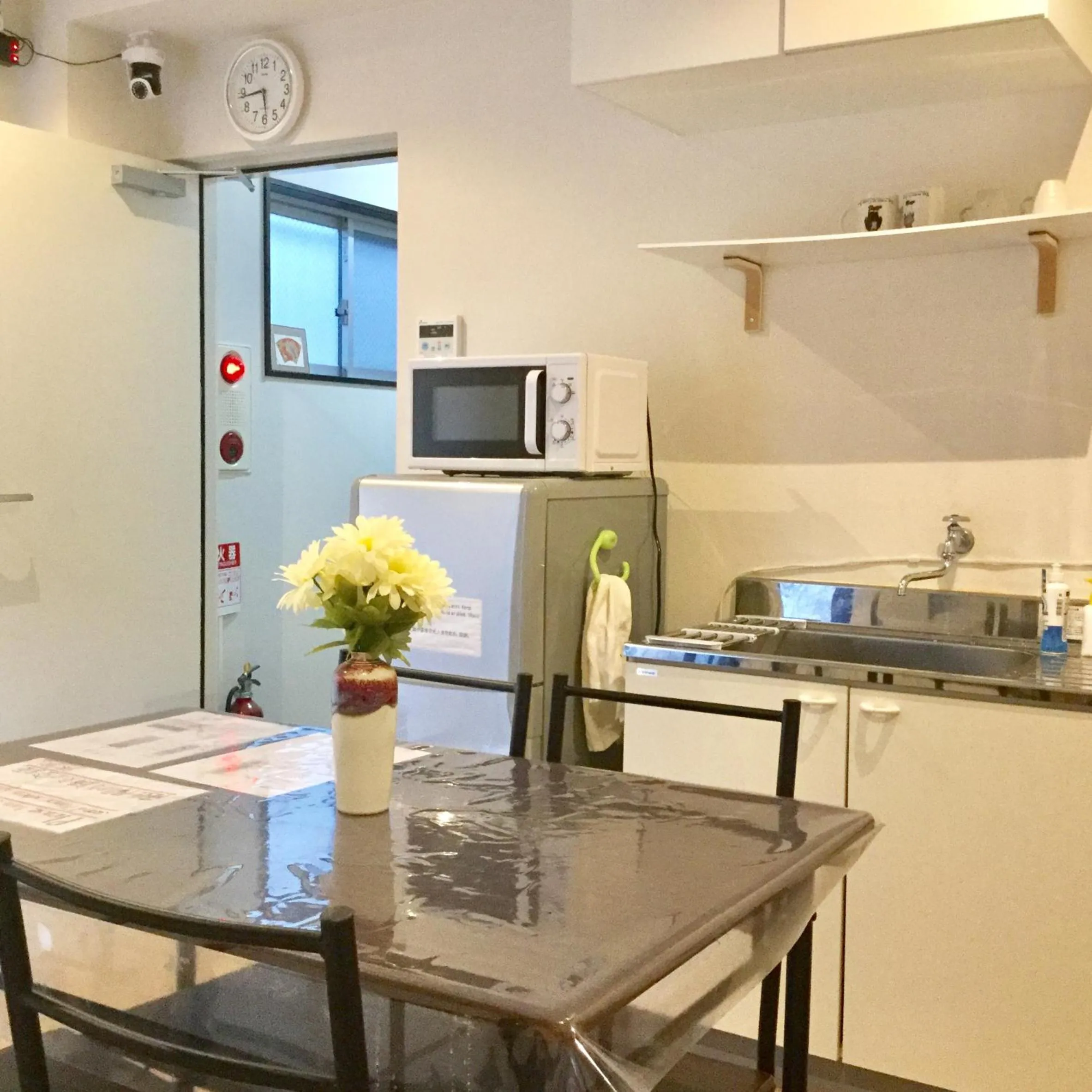 Communal lounge/ TV room in Keimei Guest House