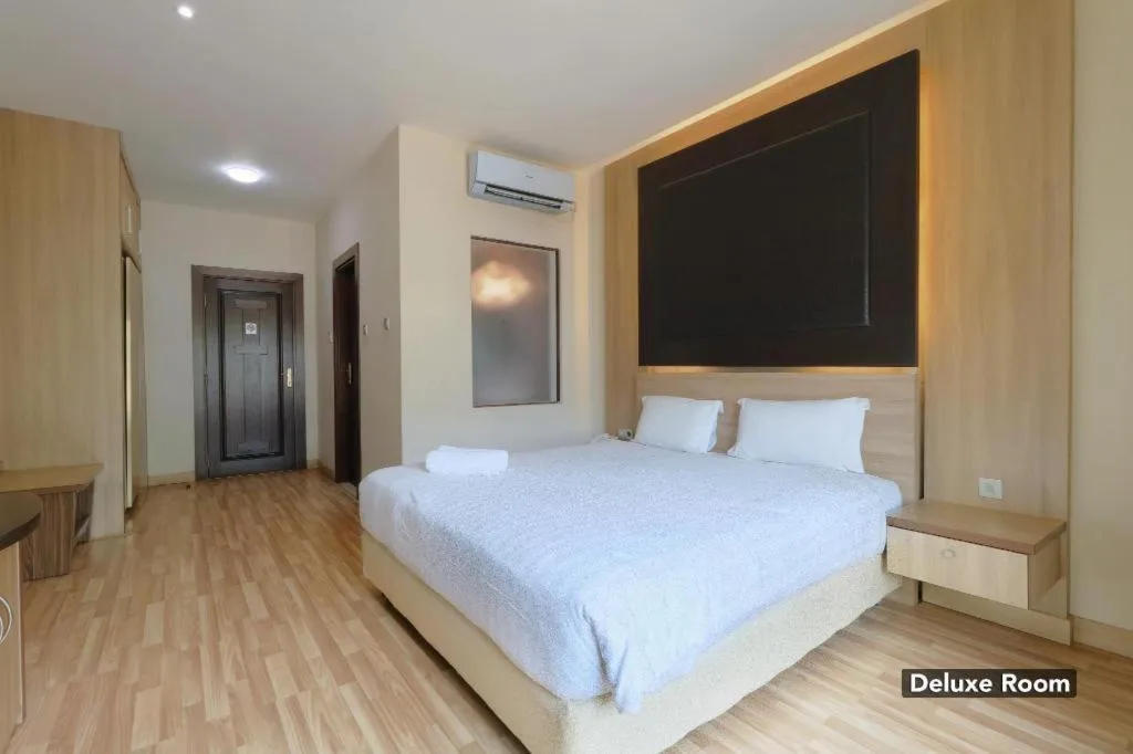 Bed in Mutiara Suites