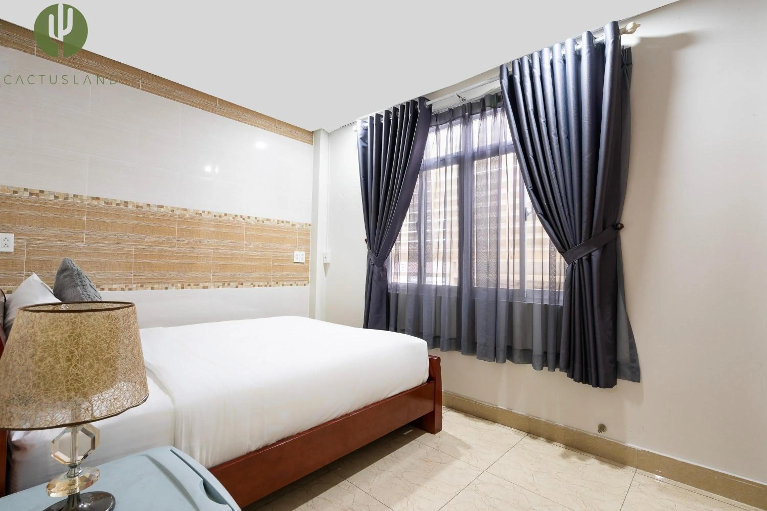 Photo of the whole room, Bed in Cactusland Hotel Tan Binh Near T3 Station