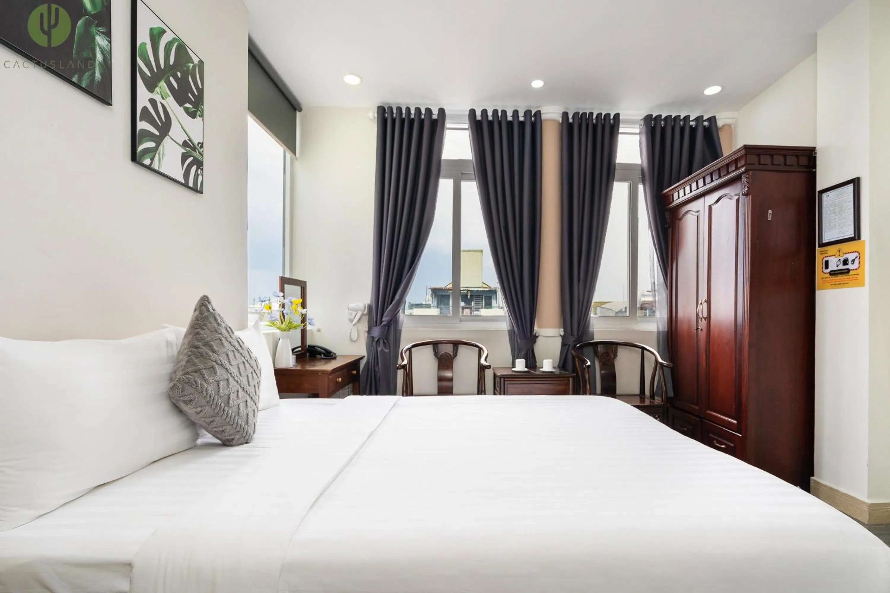 Photo of the whole room, Bed in Cactusland Hotel Tan Binh Near T3 Station