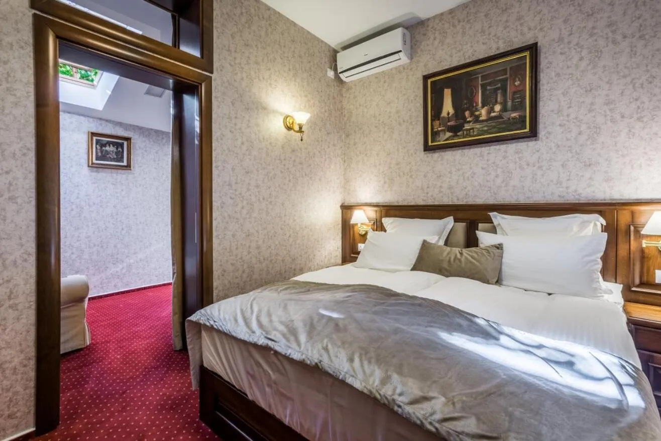 Bed in Noblesse Boutique Resort