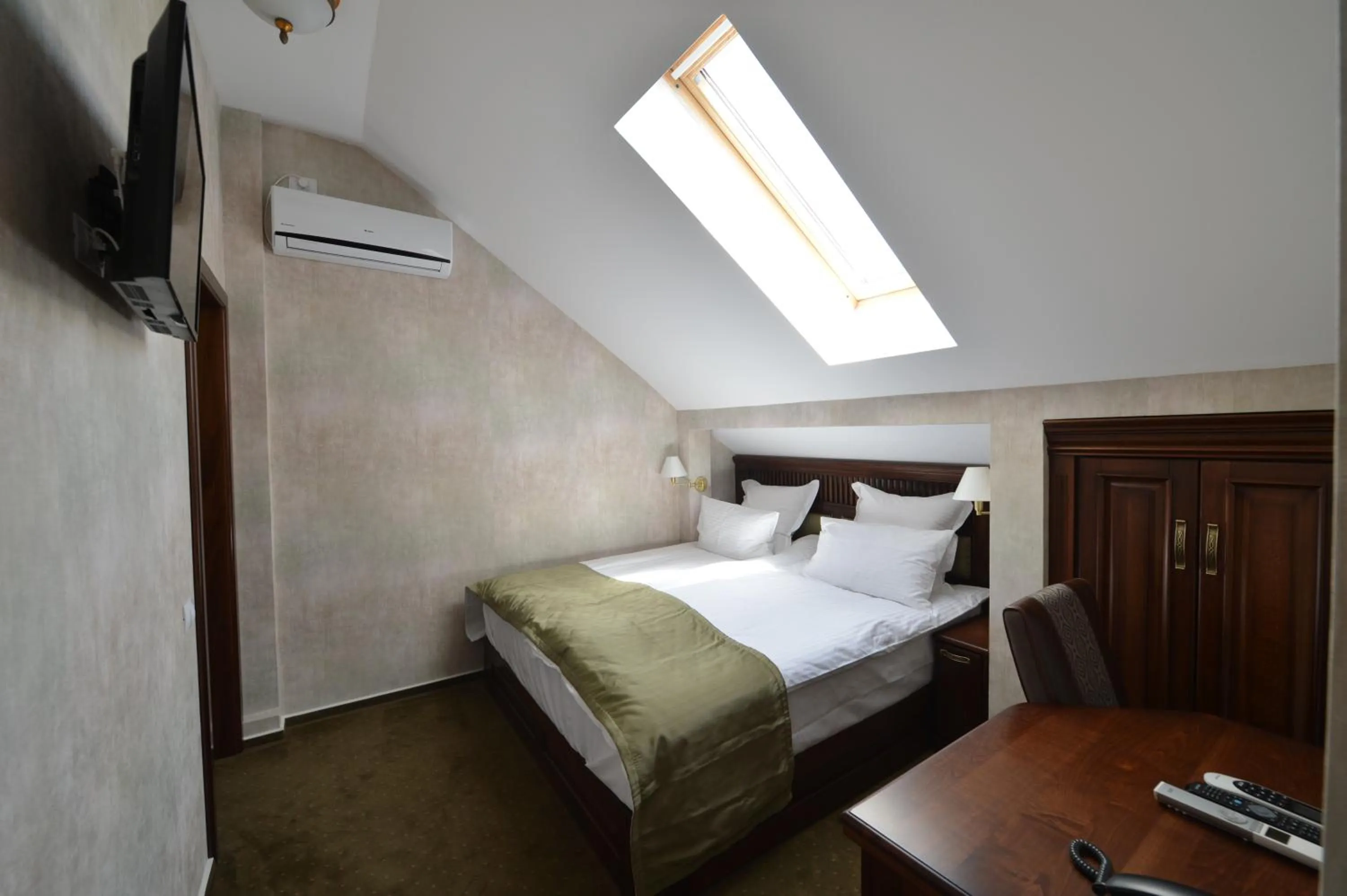 Bed in Noblesse Boutique Resort