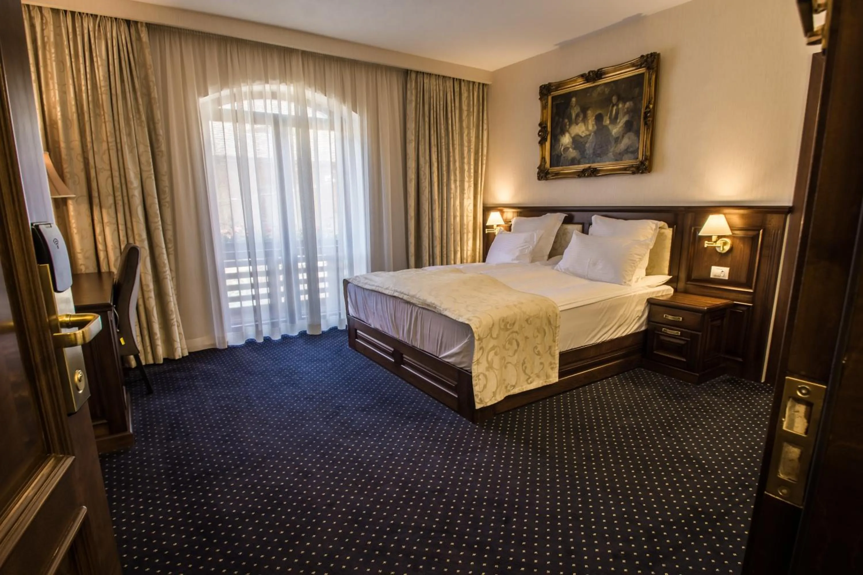 Bed in Noblesse Boutique Resort