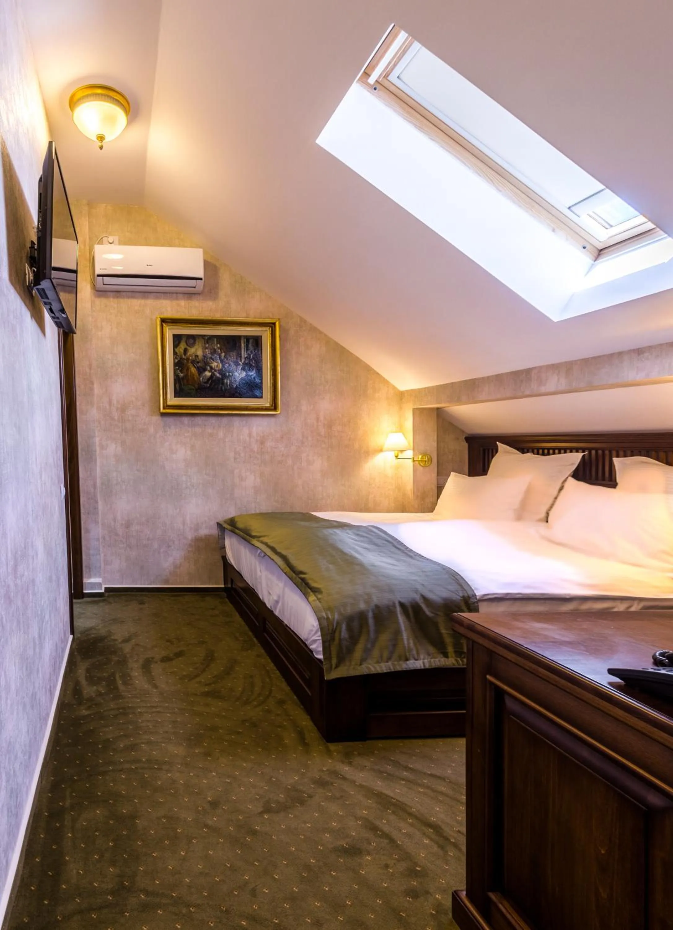 Bed in Noblesse Boutique Resort