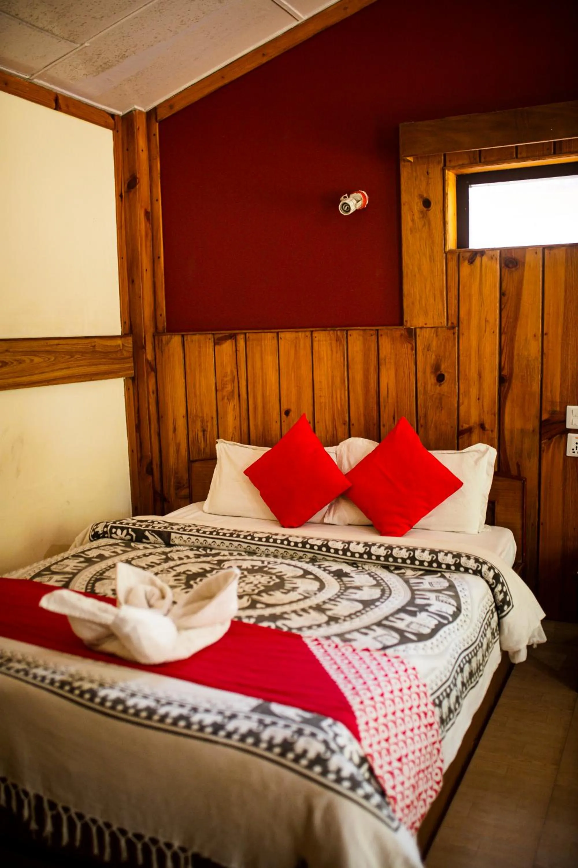 Bed in Chitwan Riverside Resort