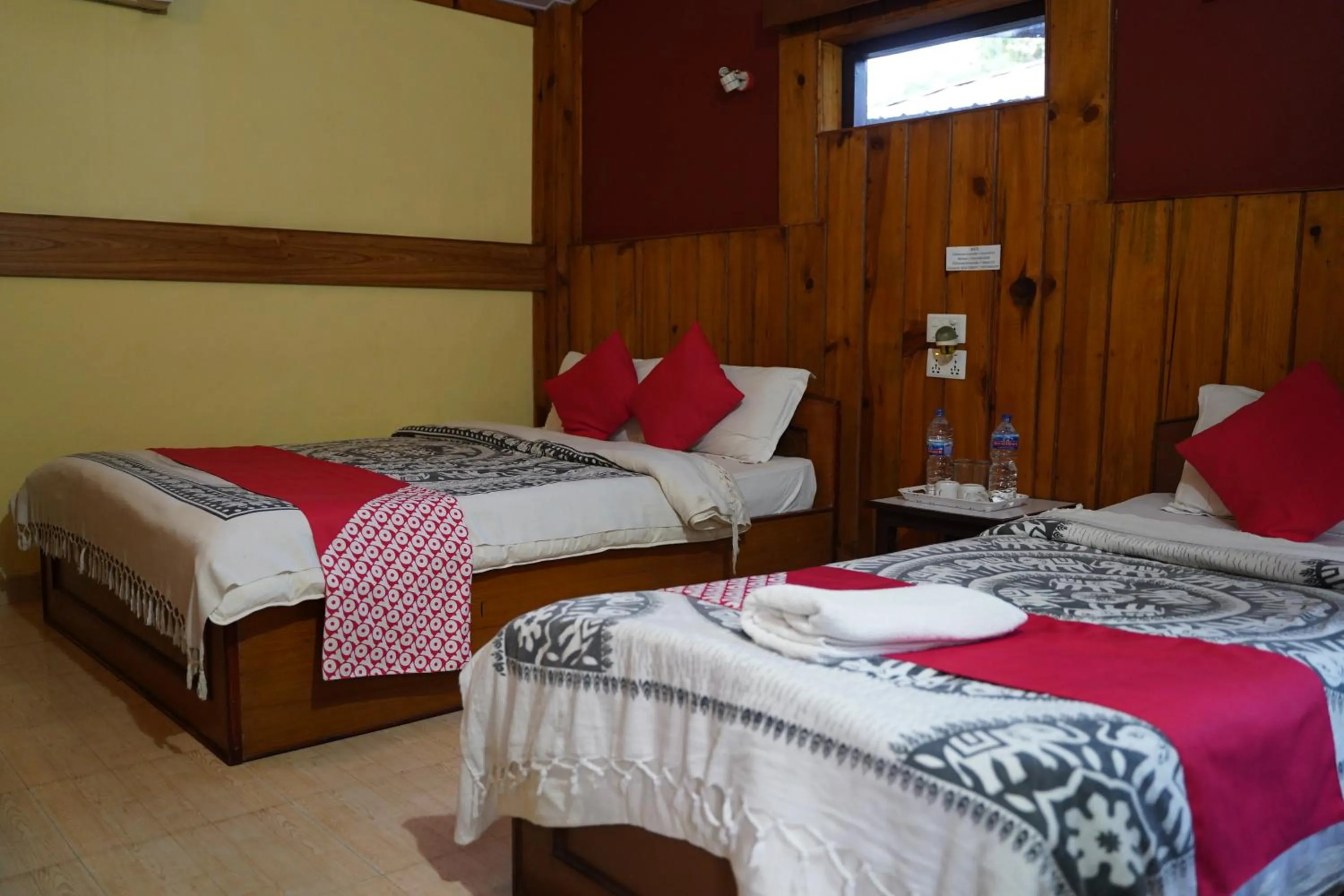 Bed in Chitwan Riverside Resort