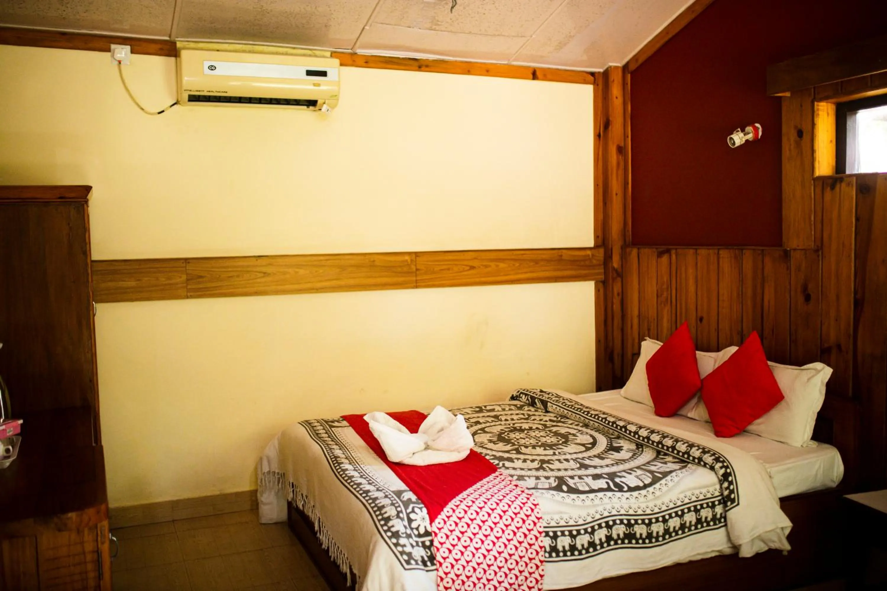 Bed in Chitwan Riverside Resort