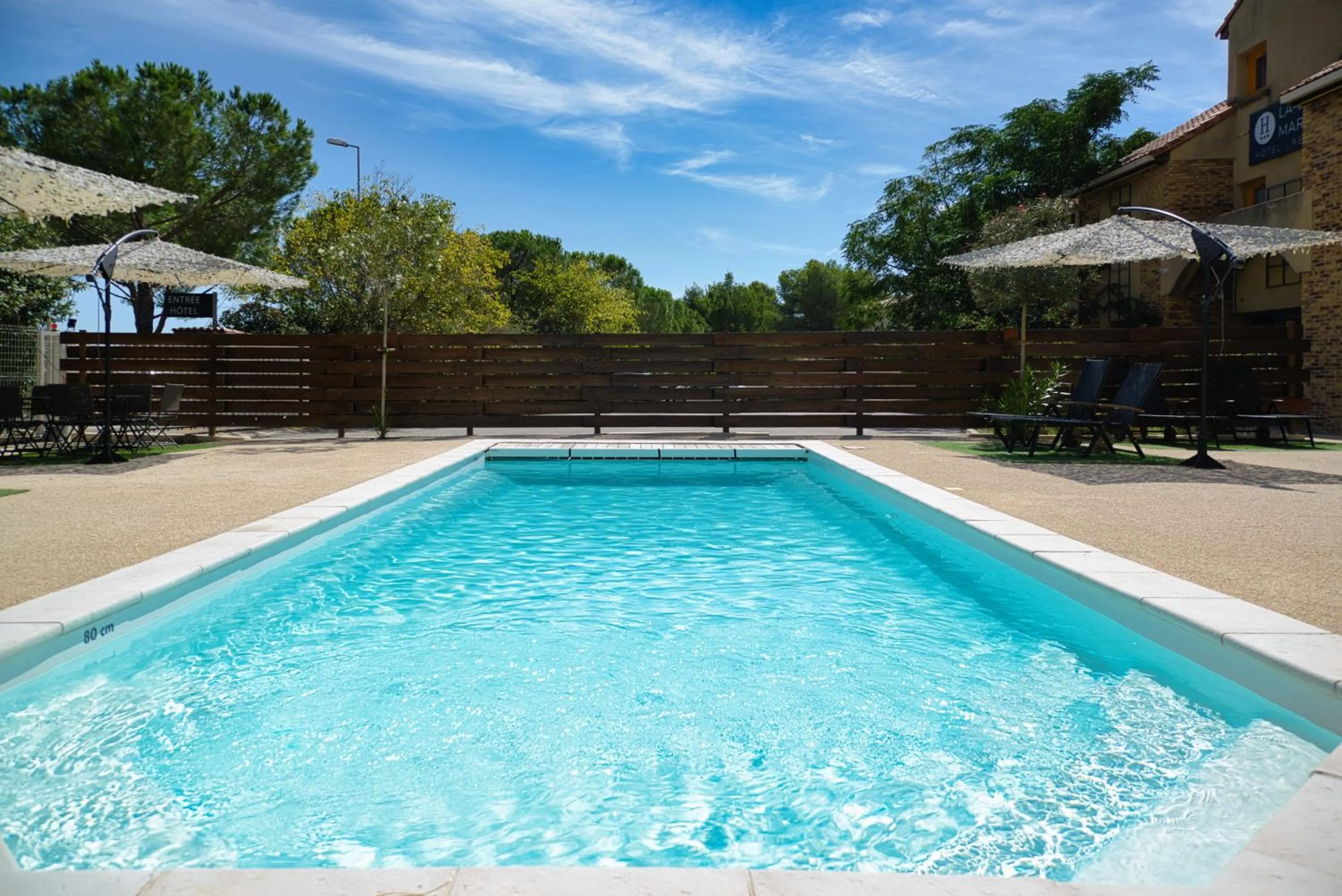 Swimming pool in Villa Martégale Hôtel Restaurant