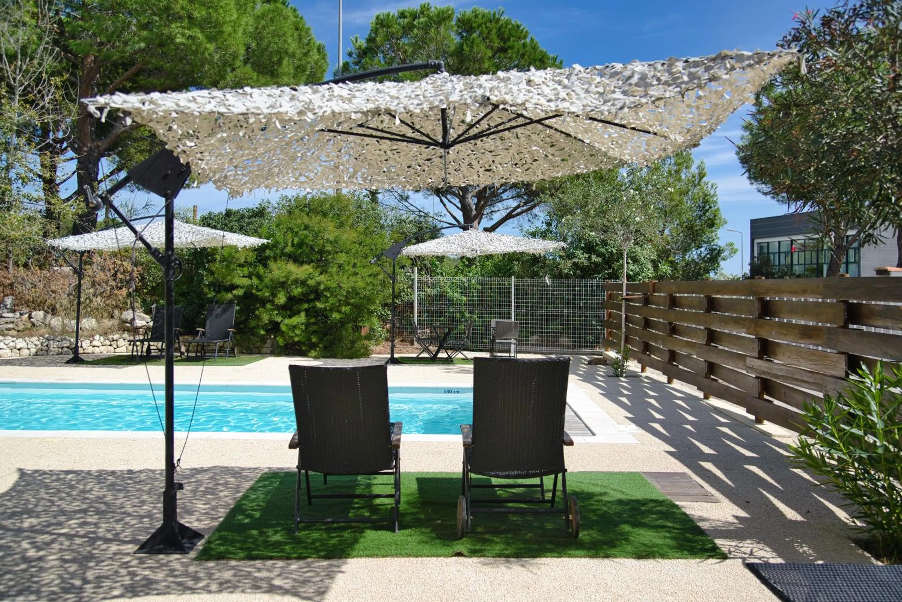 Swimming pool in Villa Martégale Hôtel Restaurant