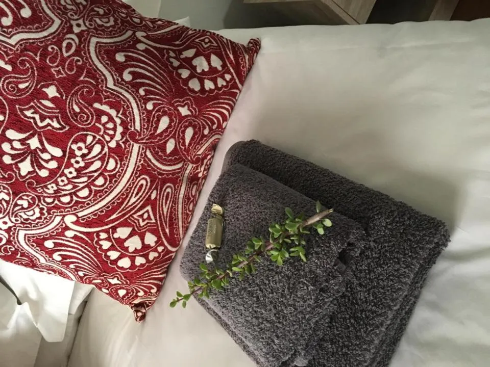 Bed in Klein Karoo Game Lodge