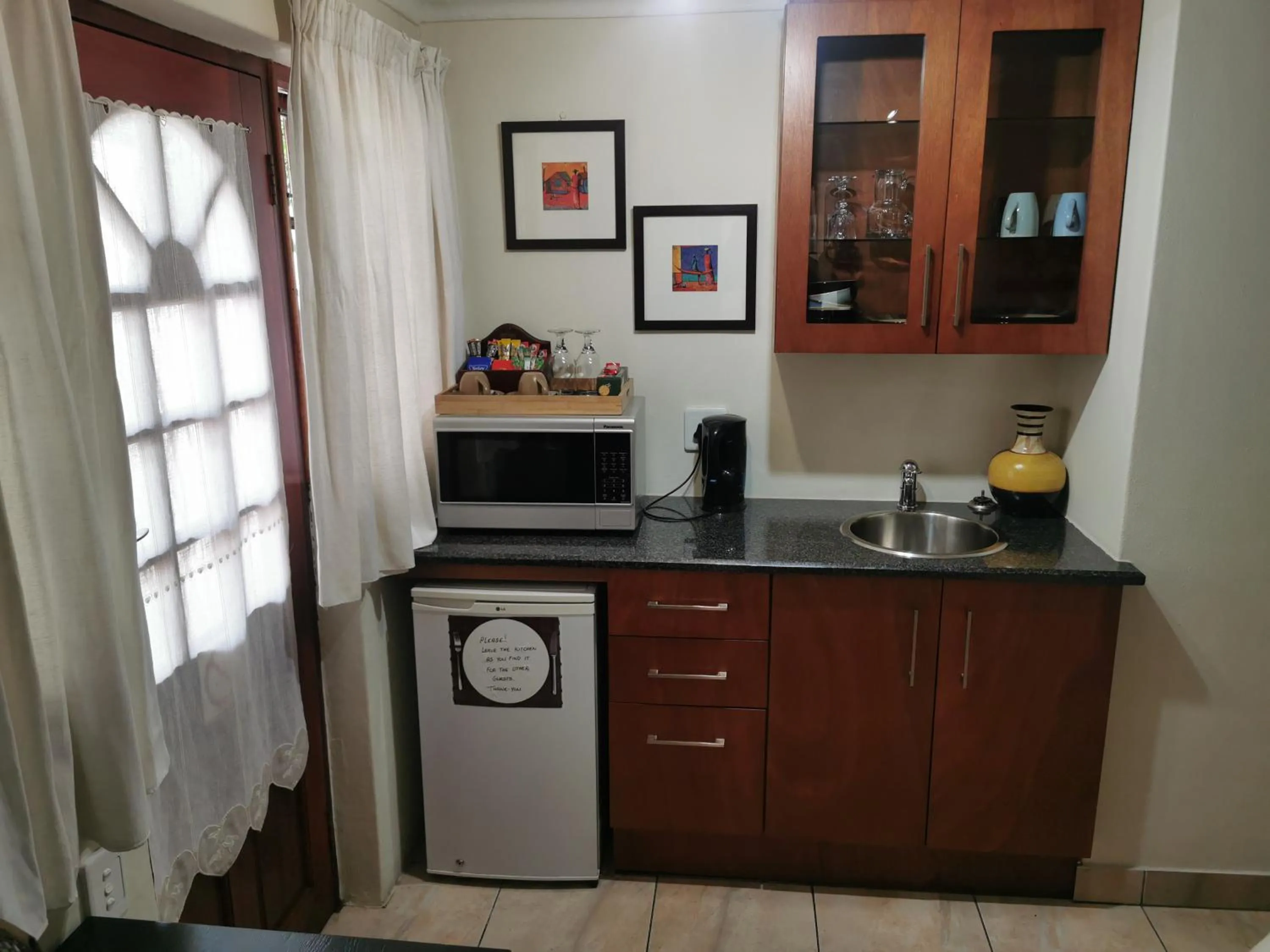 Kitchen or kitchenette in Villa Stella Guest House