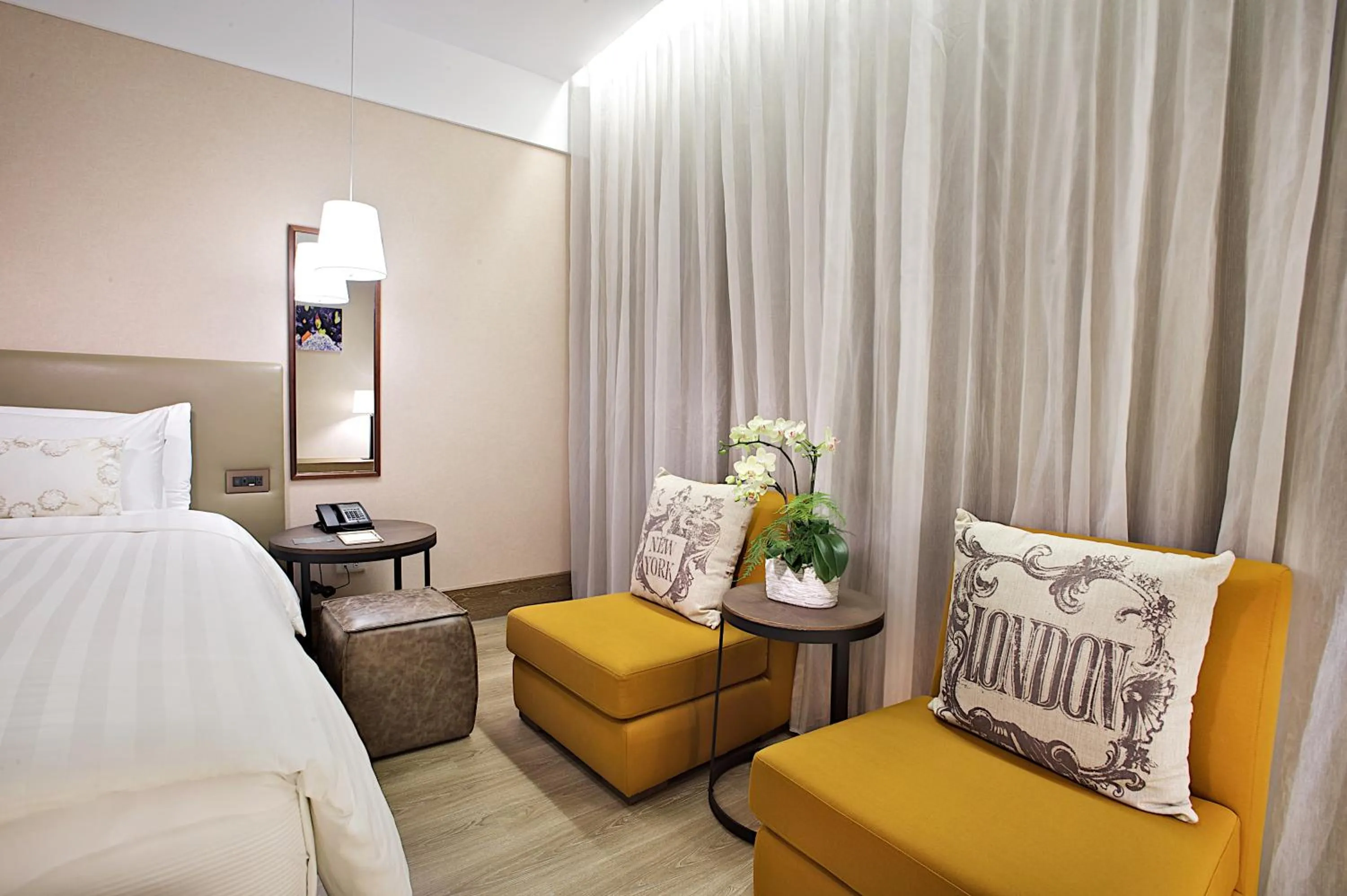 Seating area, Bed in The Gaya Hotel