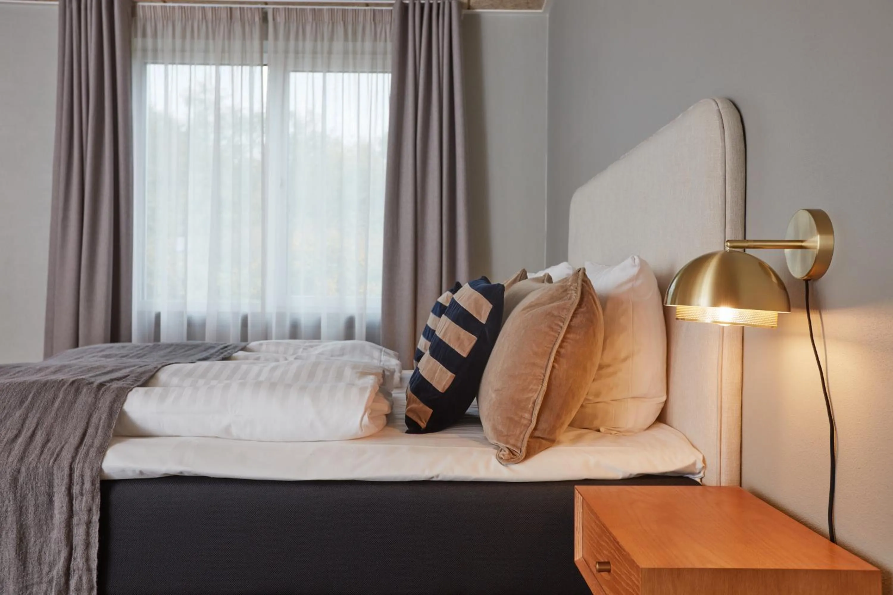 Bed in Benniksgaard Hotel