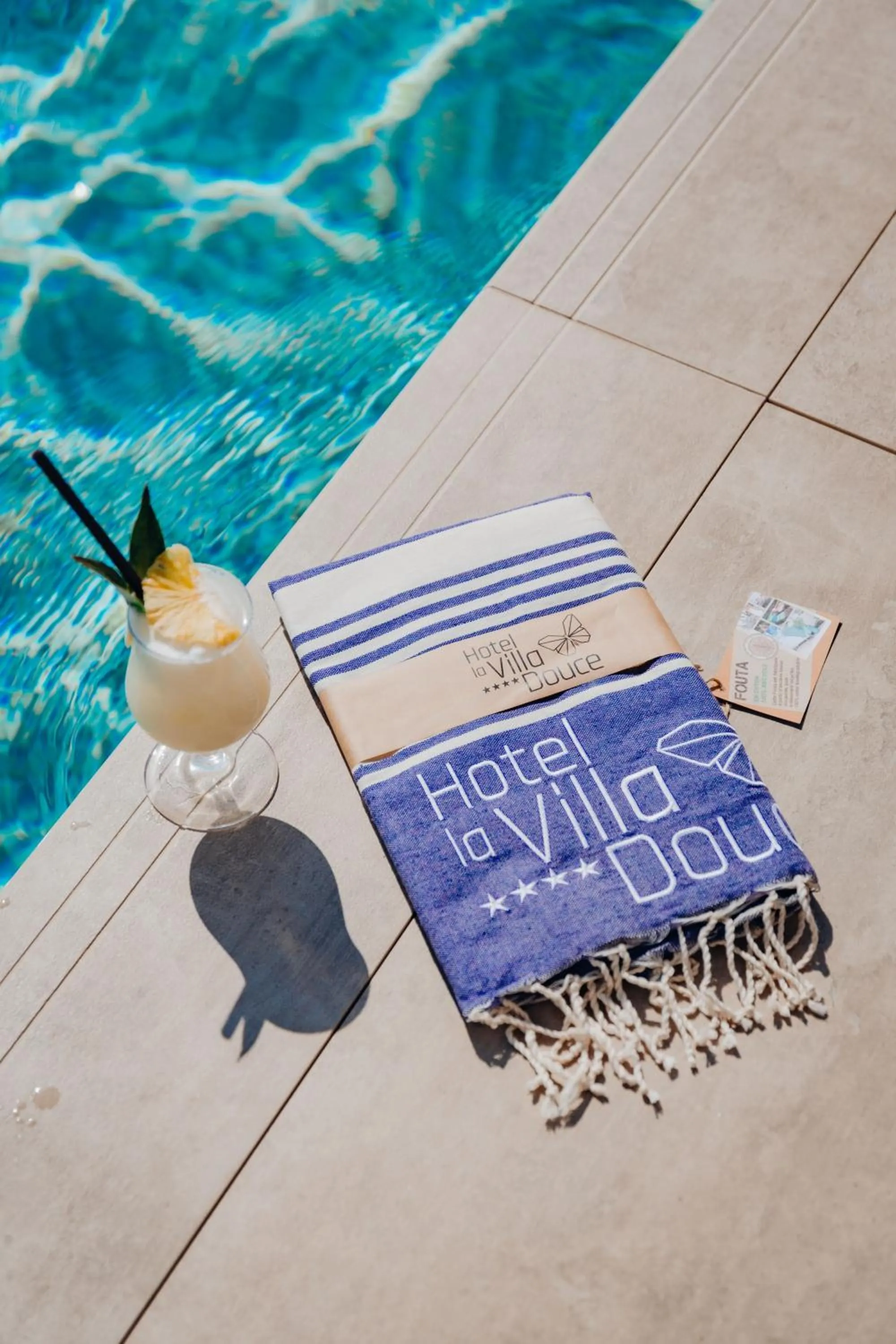 Swimming pool in Hôtel La Villa Douce