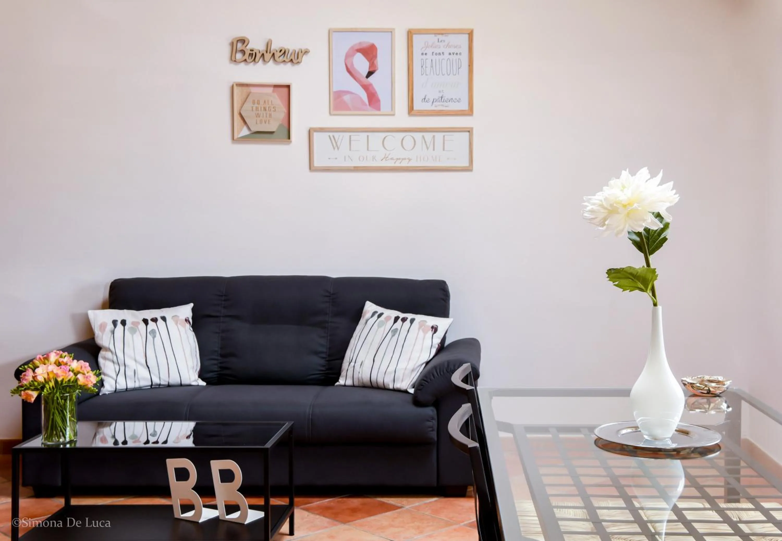 Communal lounge/ TV room in Bonjour Bonheur