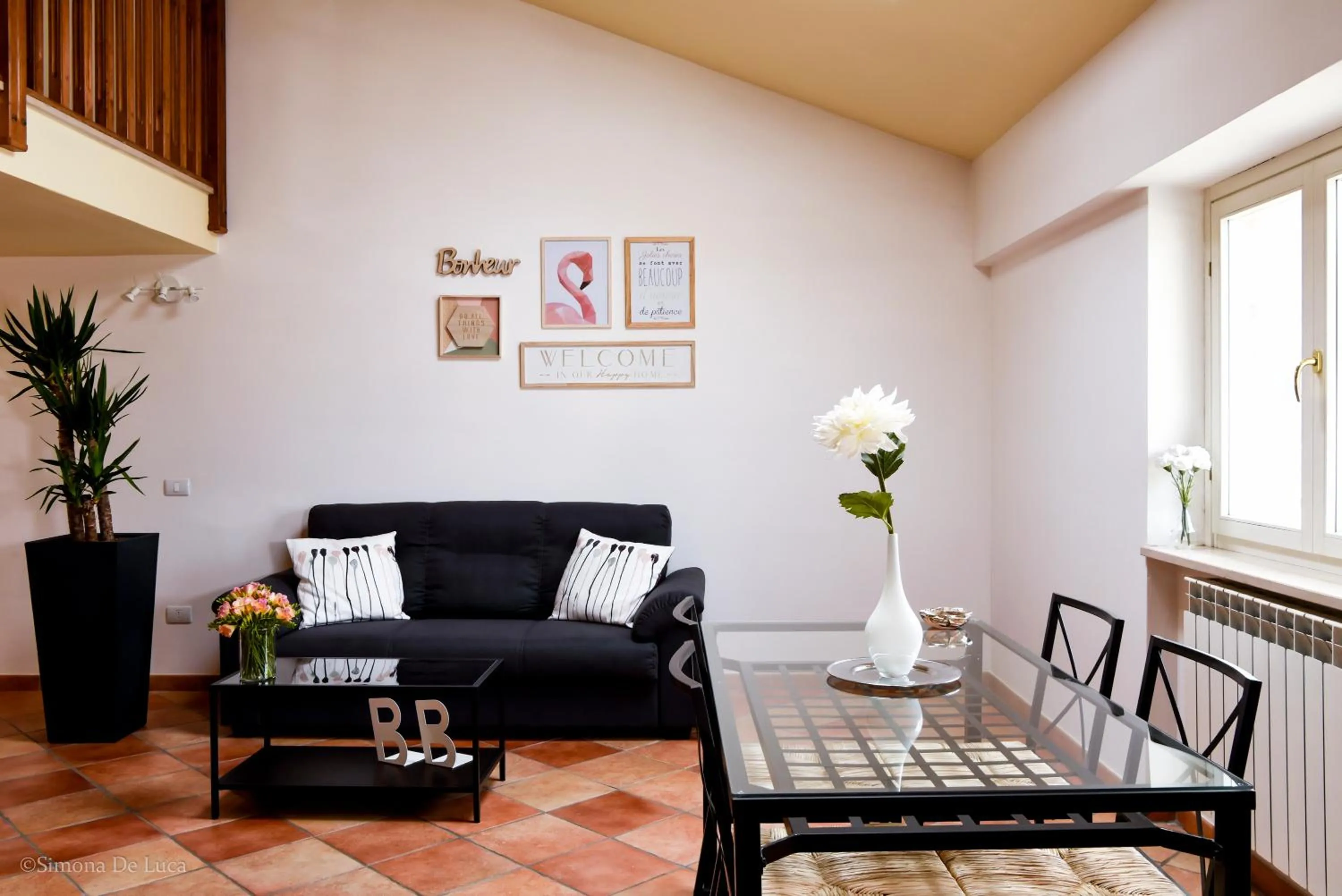 Communal lounge/ TV room in Bonjour Bonheur