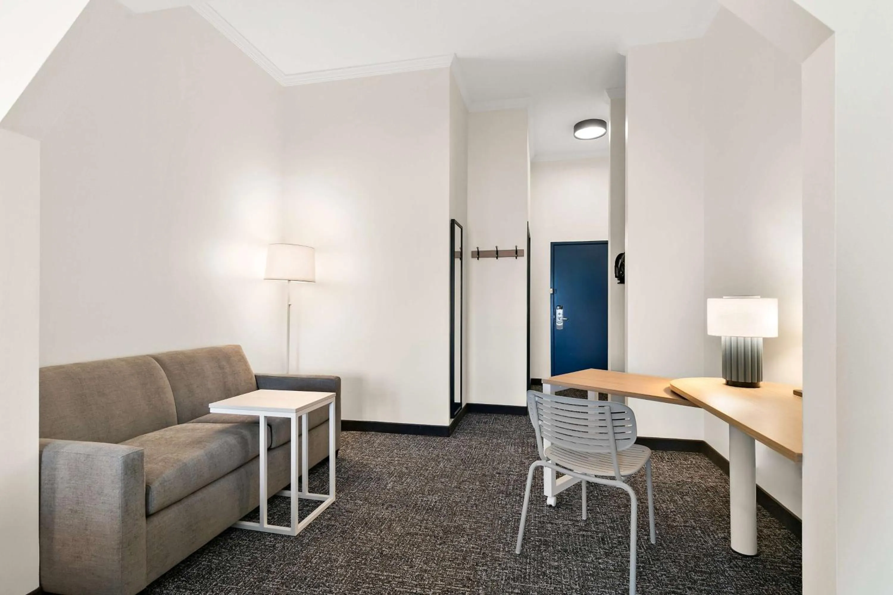 Living room in Spark by Hilton Commerce, GA