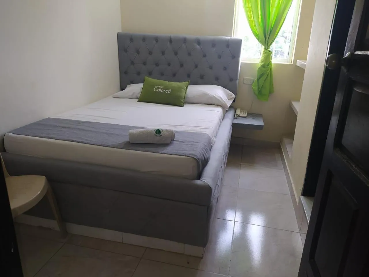 Bed in Hotel Calarca N1