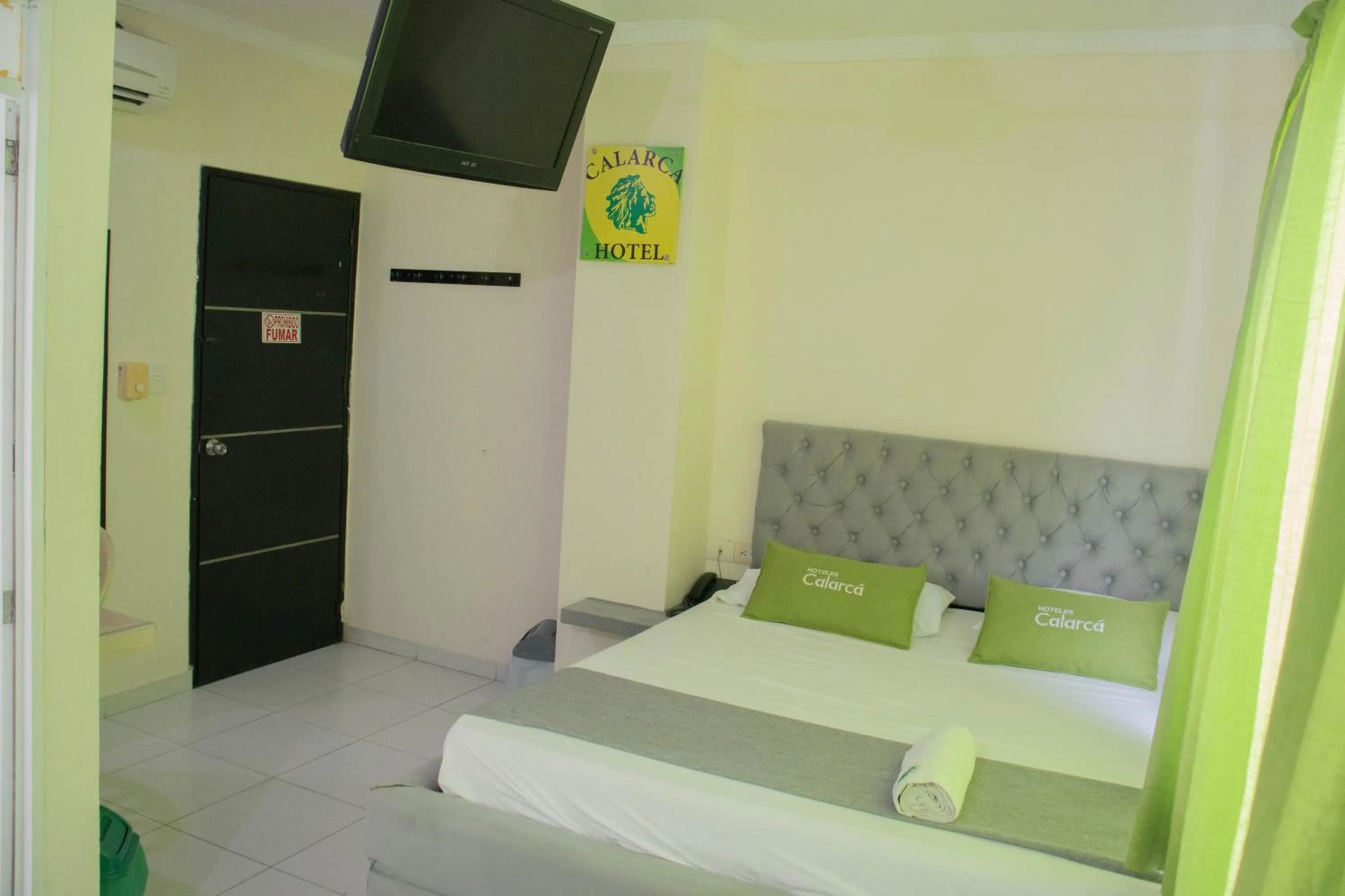 Bed in Hotel Calarca N1