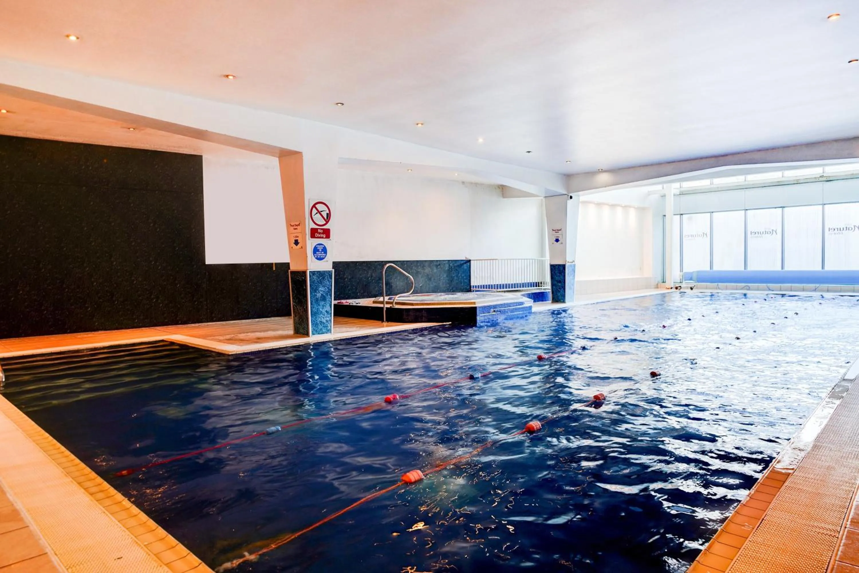 Swimming pool in Holland House Hotel Cardiff By Sunday