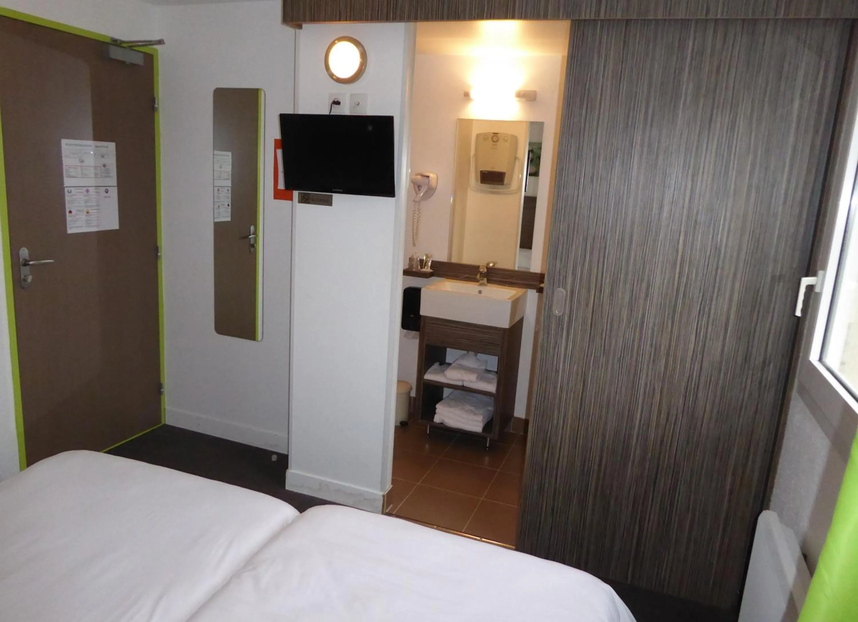 Bedroom, Bed in Hôtel Le Cosy Blois Villebarou