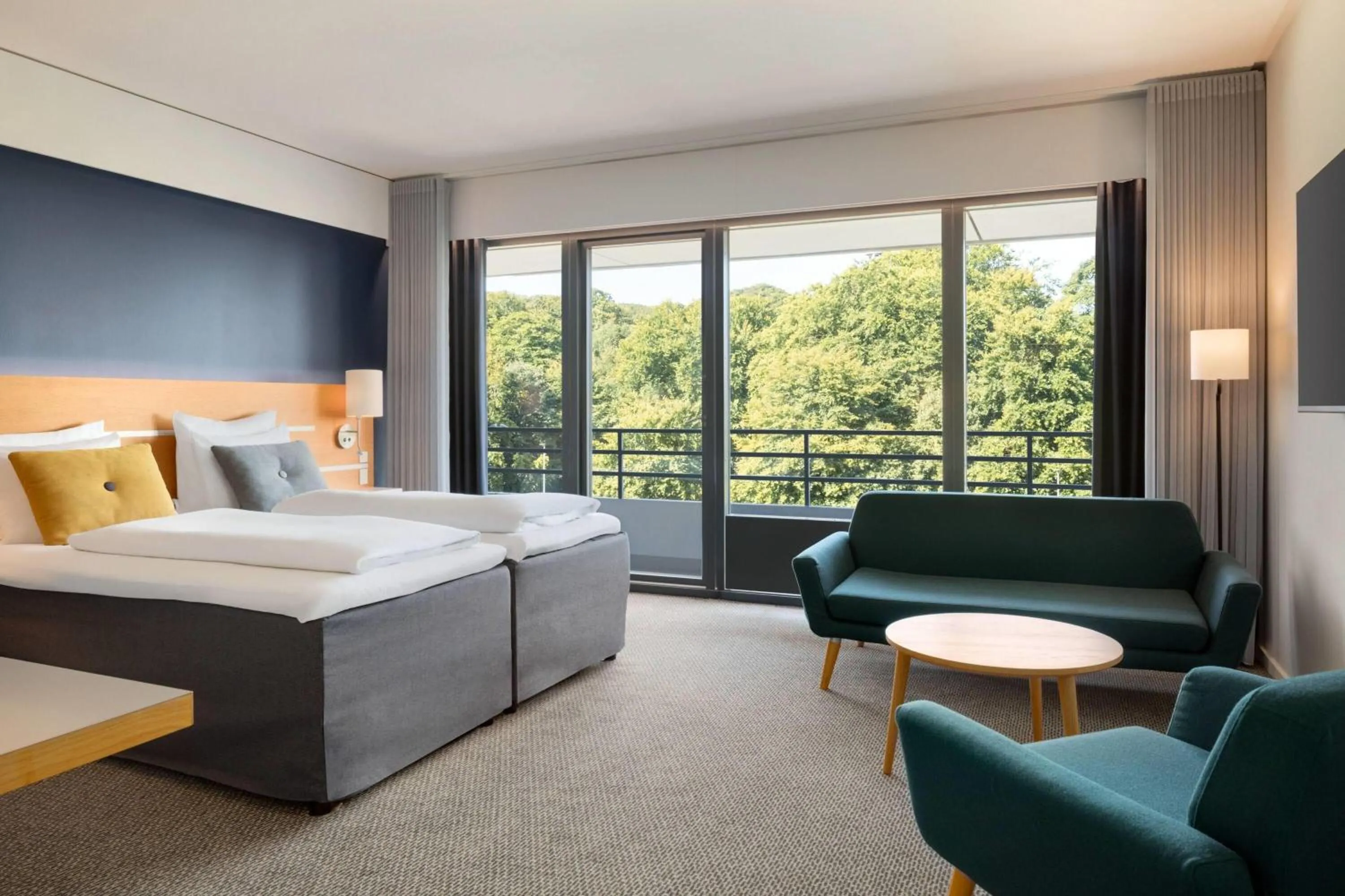 Photo of the whole room, Bed in Comwell Hvide Hus Aalborg, Dolce by Wyndham