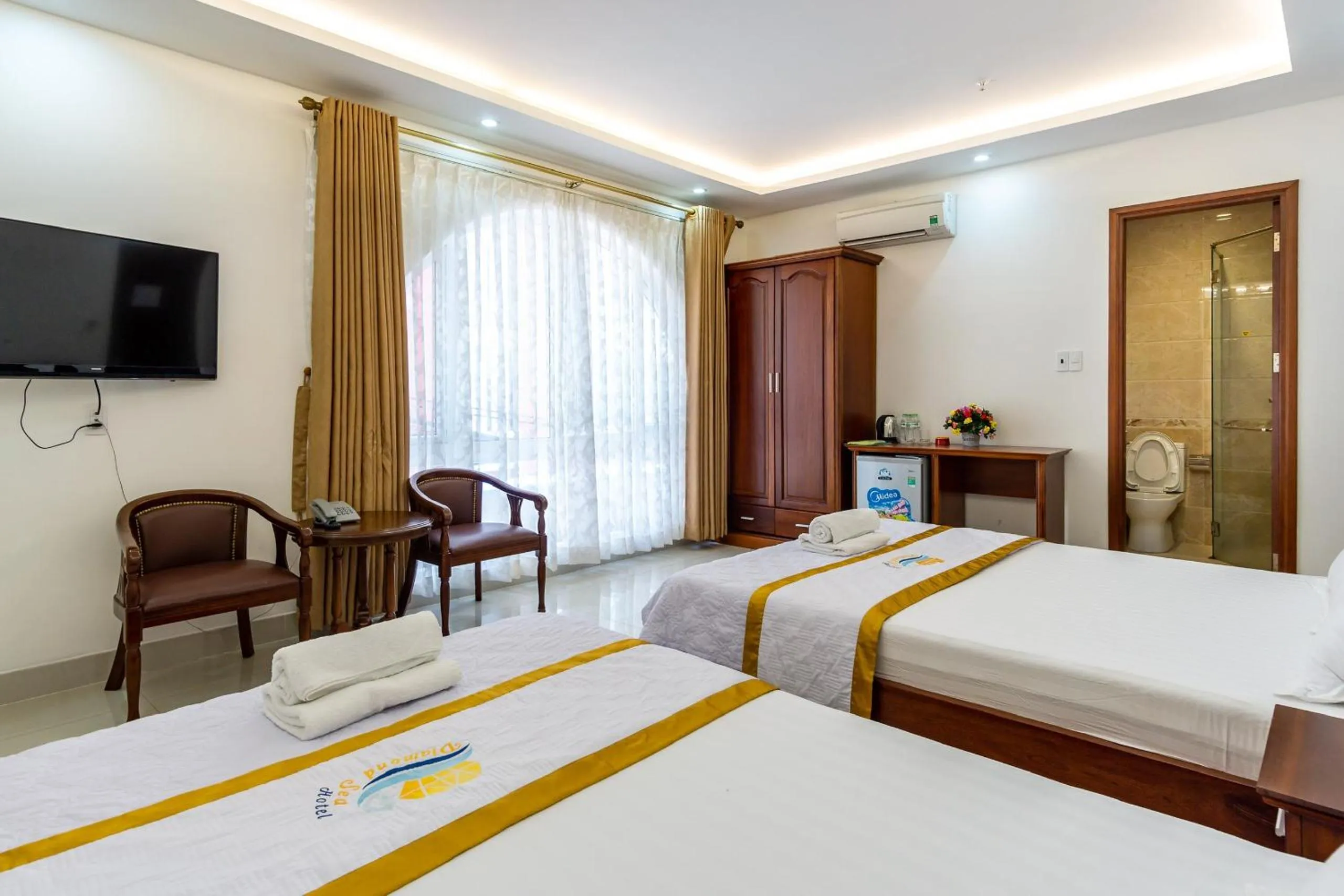 Bed in Diamond Sea Hotel