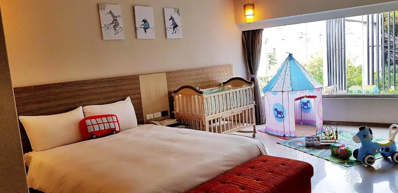 Bed in Esun Villa Hotel