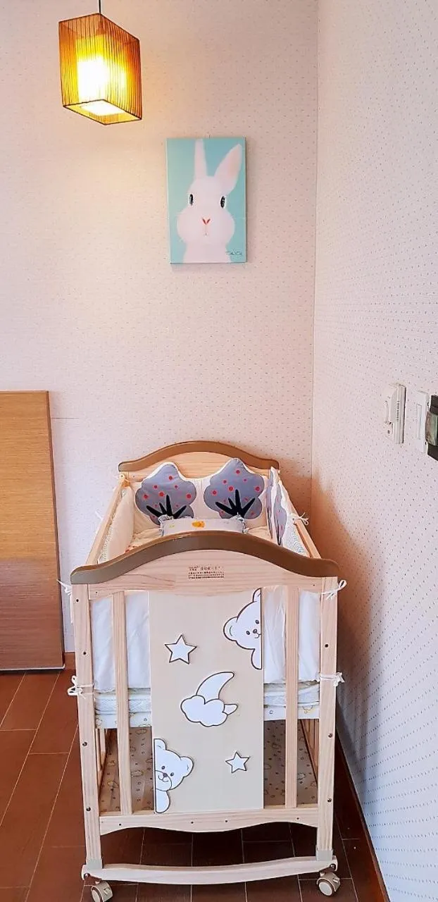 Bed in Esun Villa Hotel