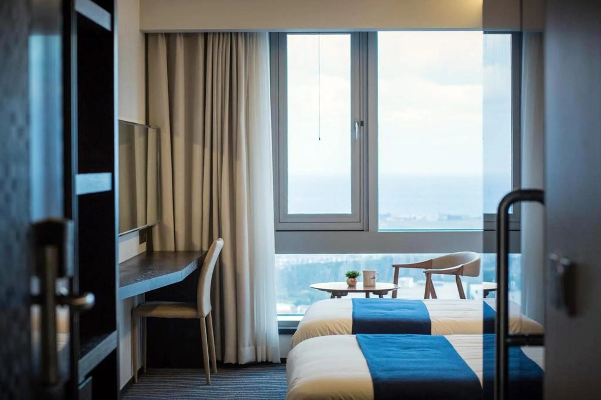 Bed in Gloucester Hotel Jeju