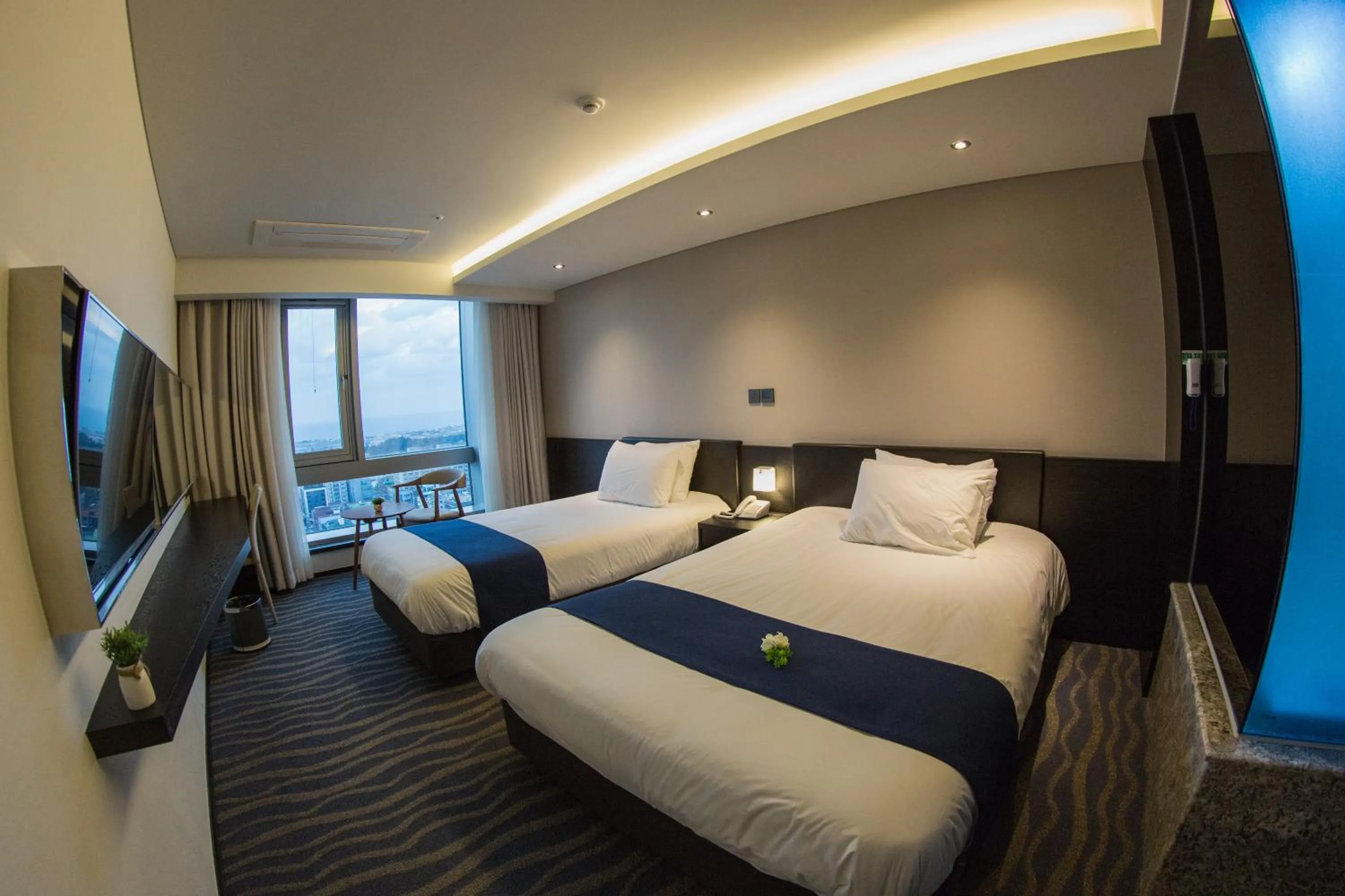 Bed in Gloucester Hotel Jeju