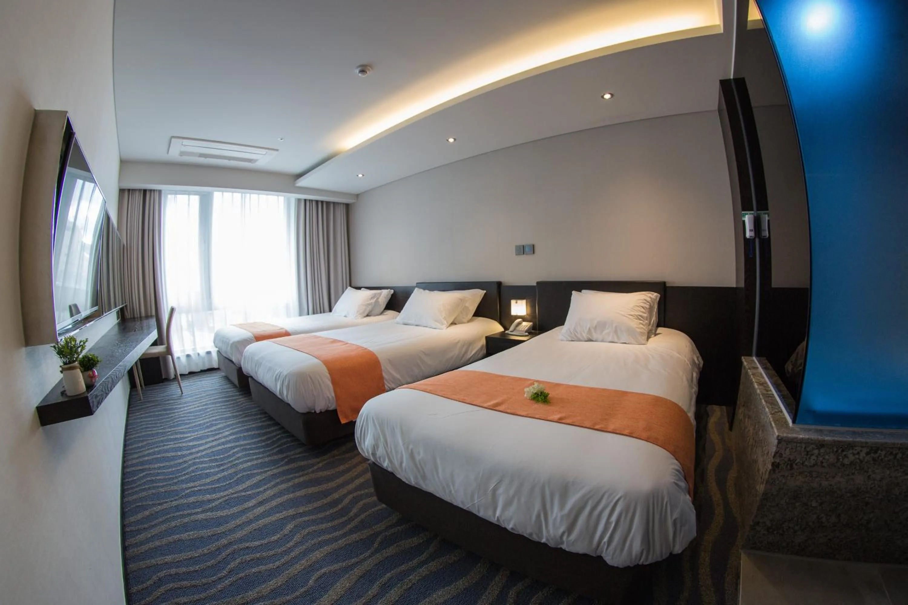 Bed in Gloucester Hotel Jeju