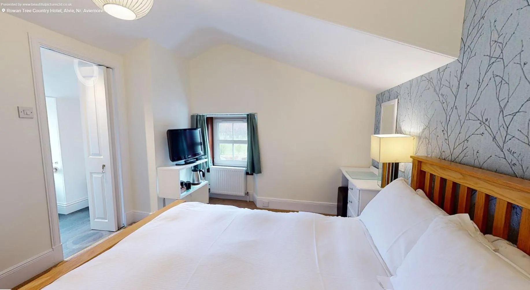 Bed in The Rowan Tree Country Hotel