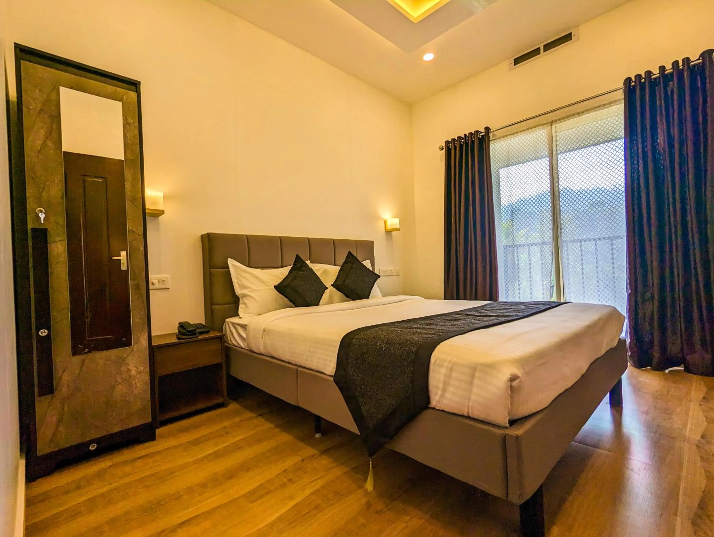 Photo of the whole room, Bed in Ayursakthi Riverdale