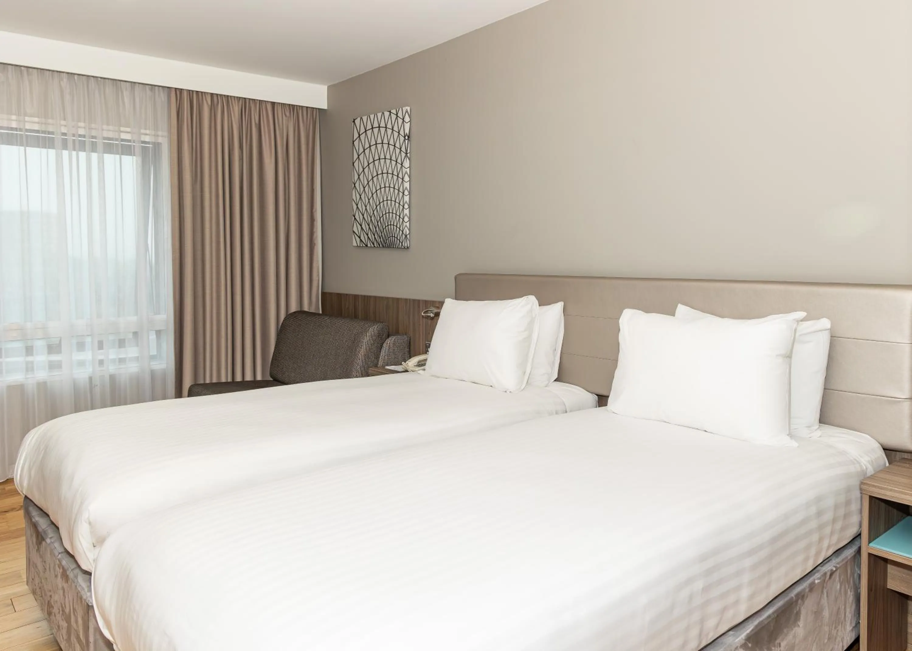 Bed in Holiday Inn London West by IHG