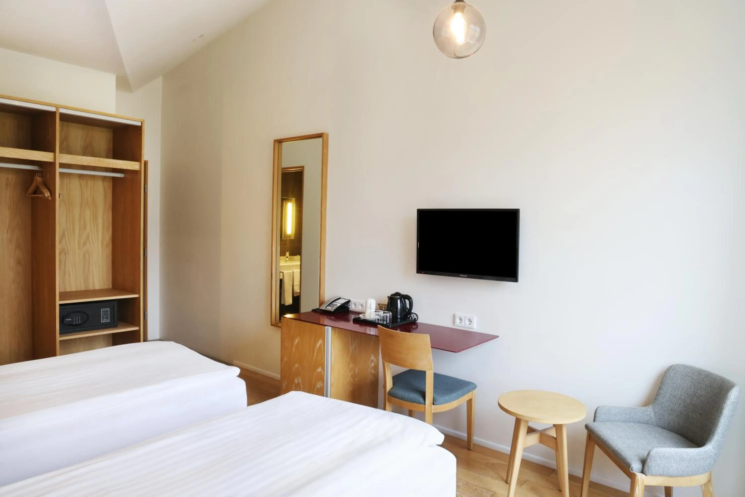 Communal lounge/ TV room, Bed in Fosshotel Vatnajökull