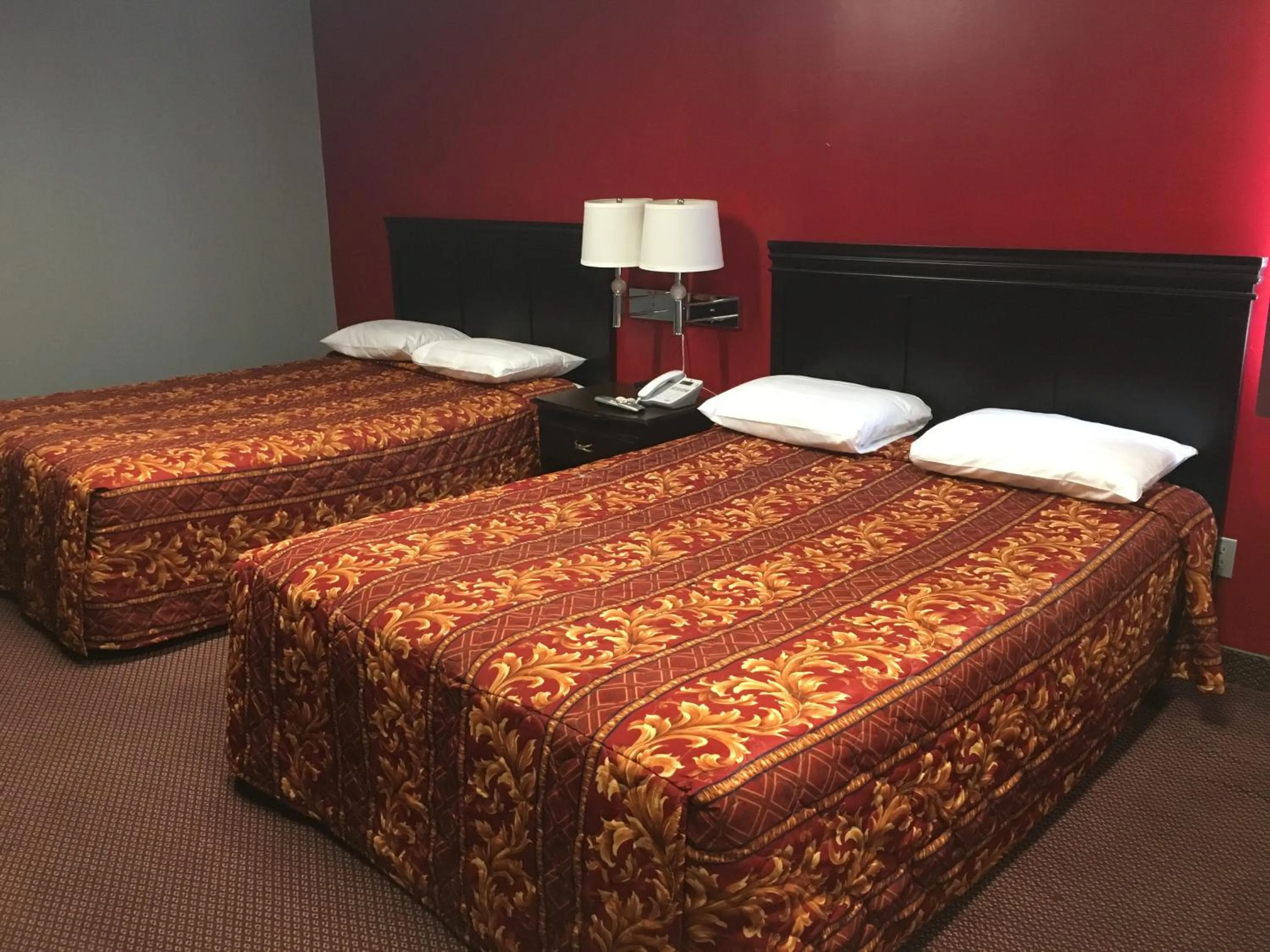 Bed in Haven Inn & Suites