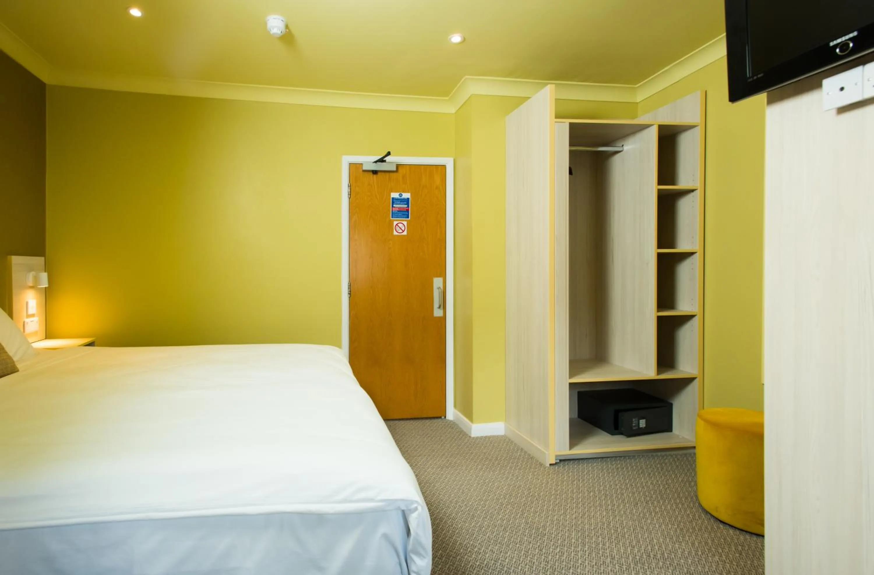 Photo of the whole room, Bed in Caring Hotel