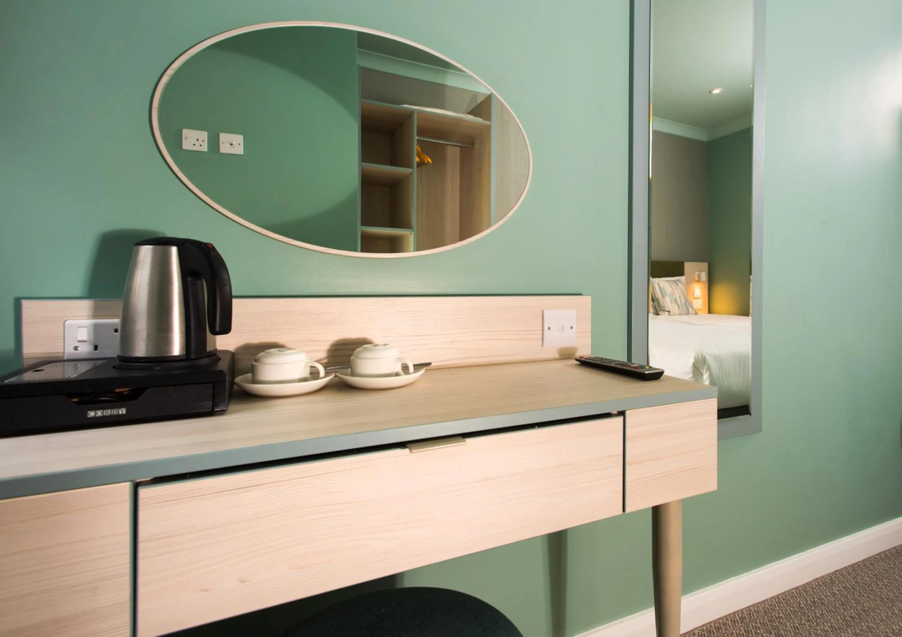 Coffee/tea facilities in Caring Hotel