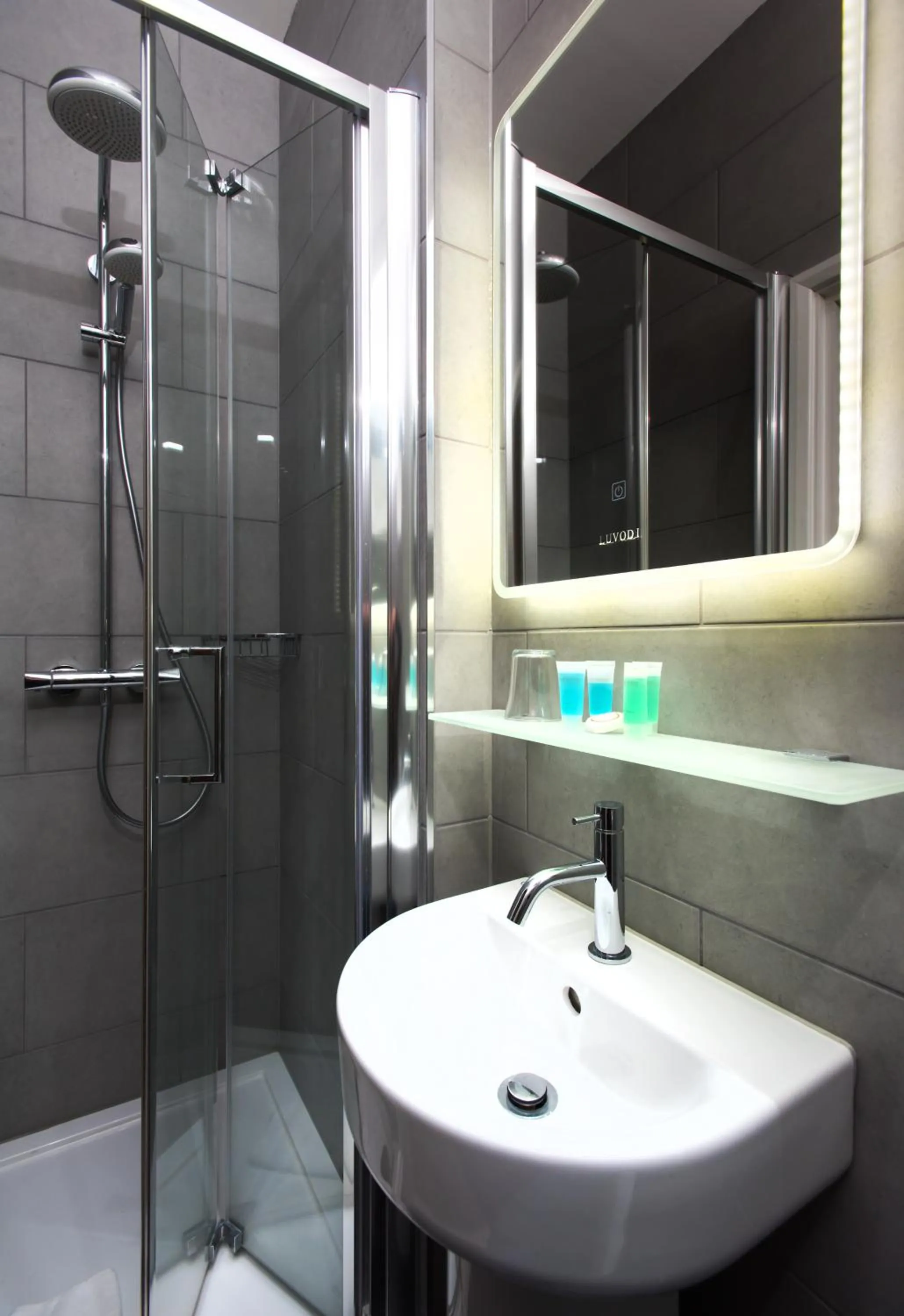 Bathroom in Caring Hotel