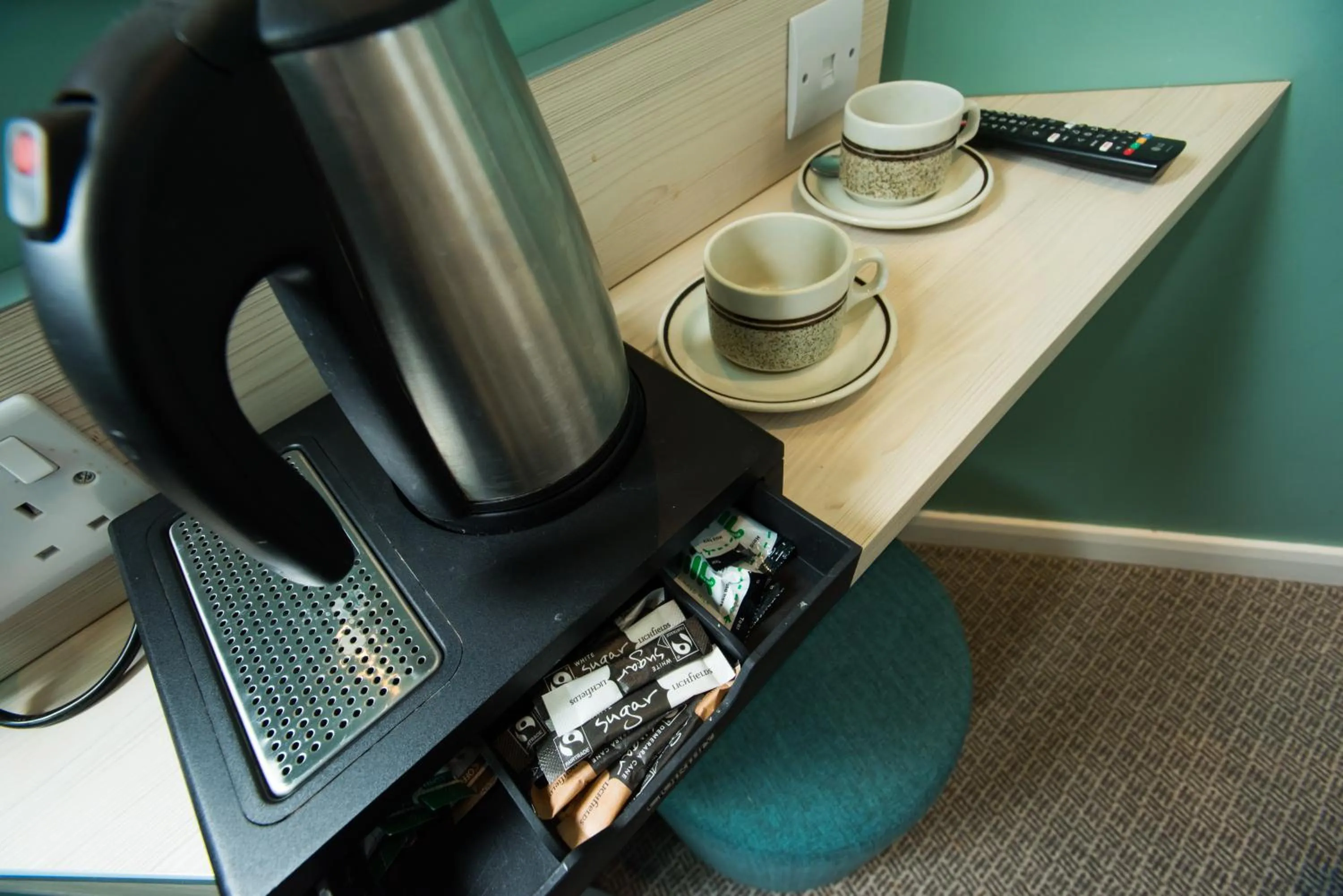 Coffee/tea facilities in Caring Hotel