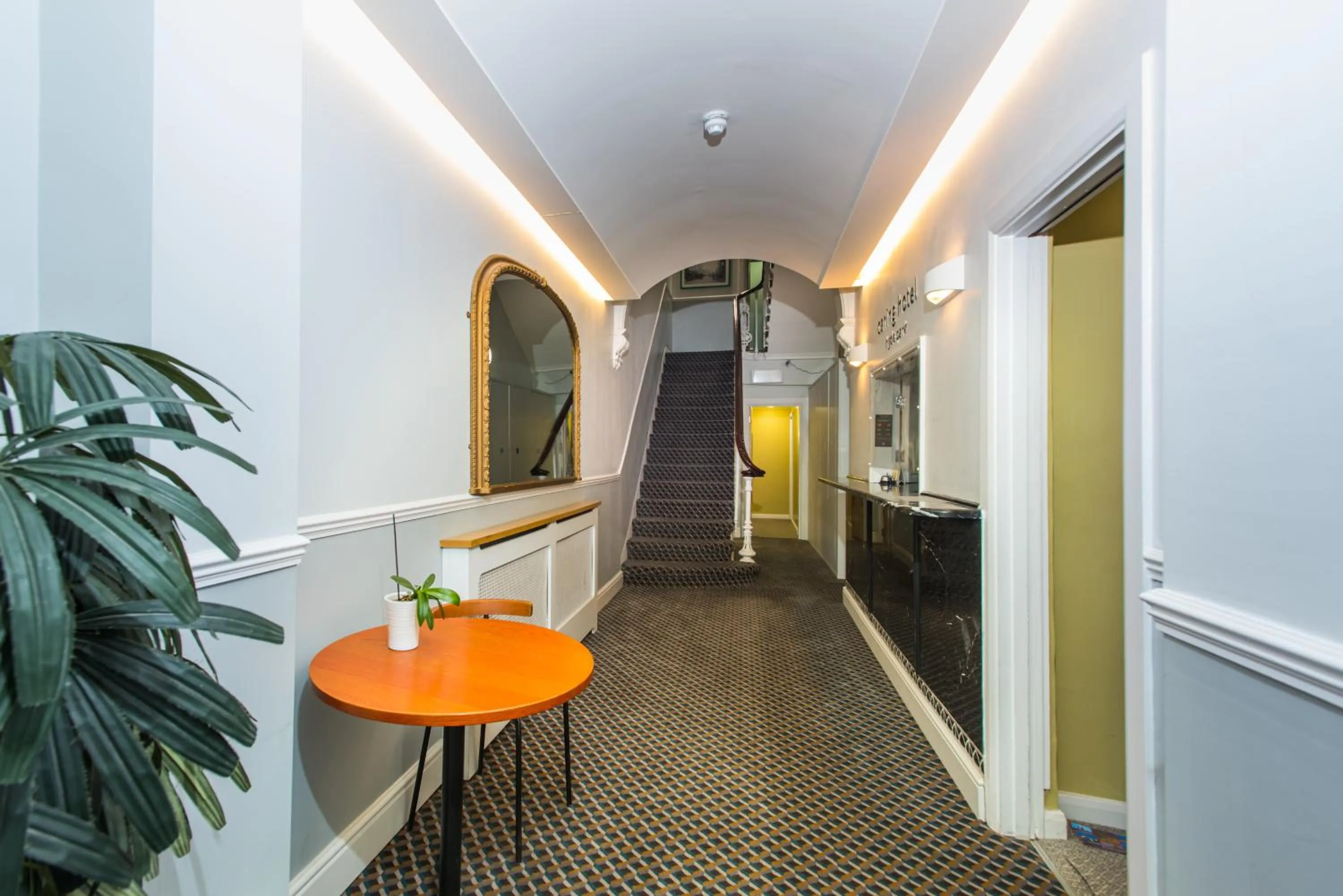 Lobby or reception in Caring Hotel