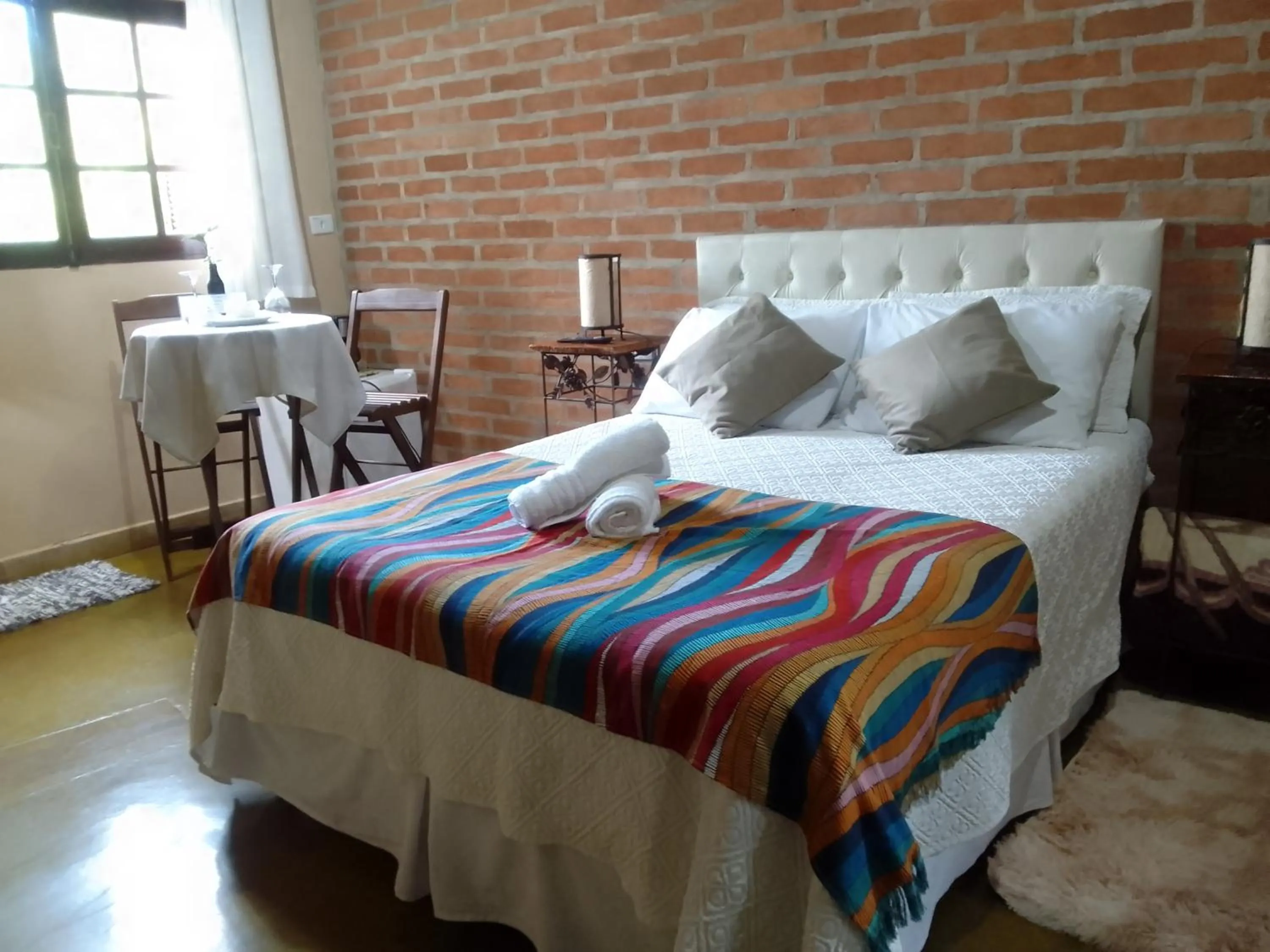 flat iron, Bed in Pousada Refugio Sol e Brisa