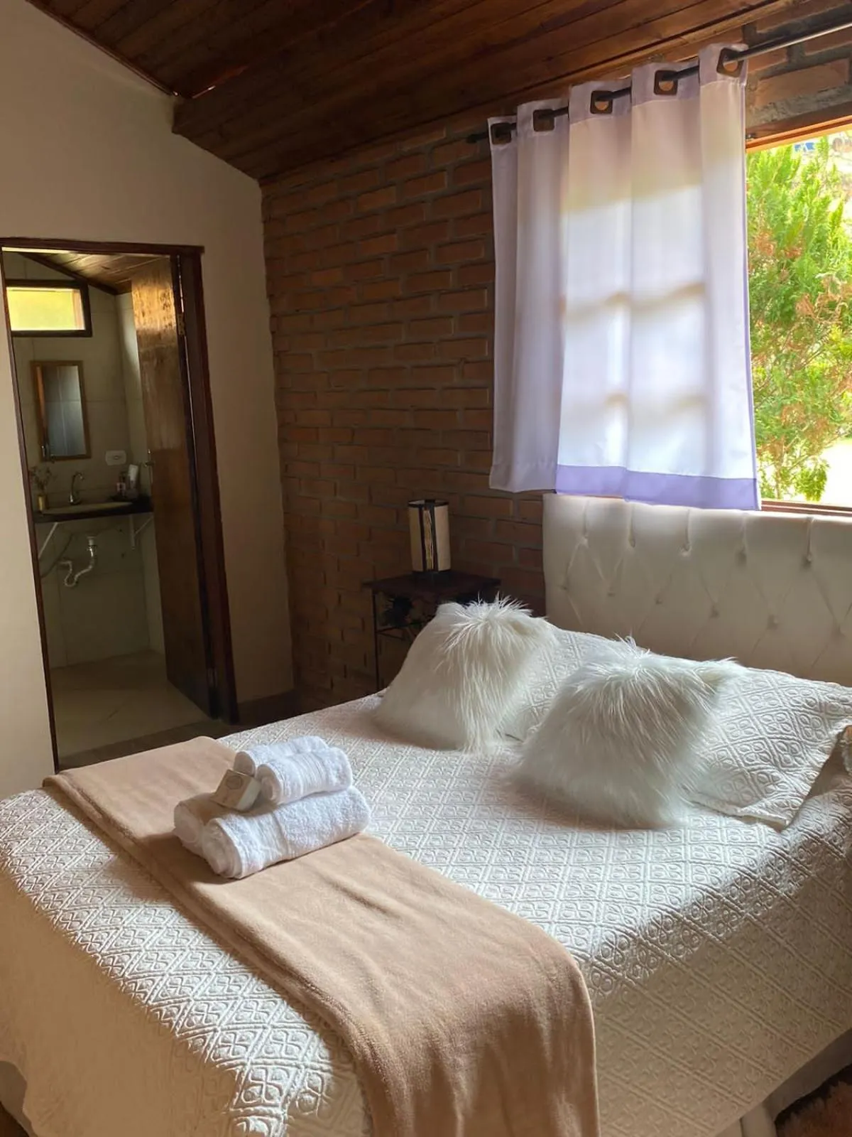 Bed in Pousada Refugio Sol e Brisa